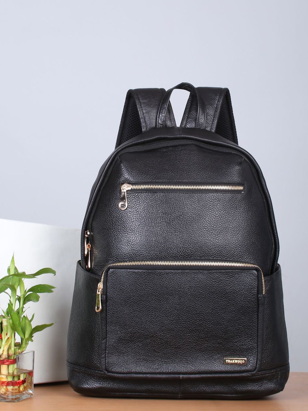 

Teakwood Women Upto 15 Inch Textured Leather Backpack, Black