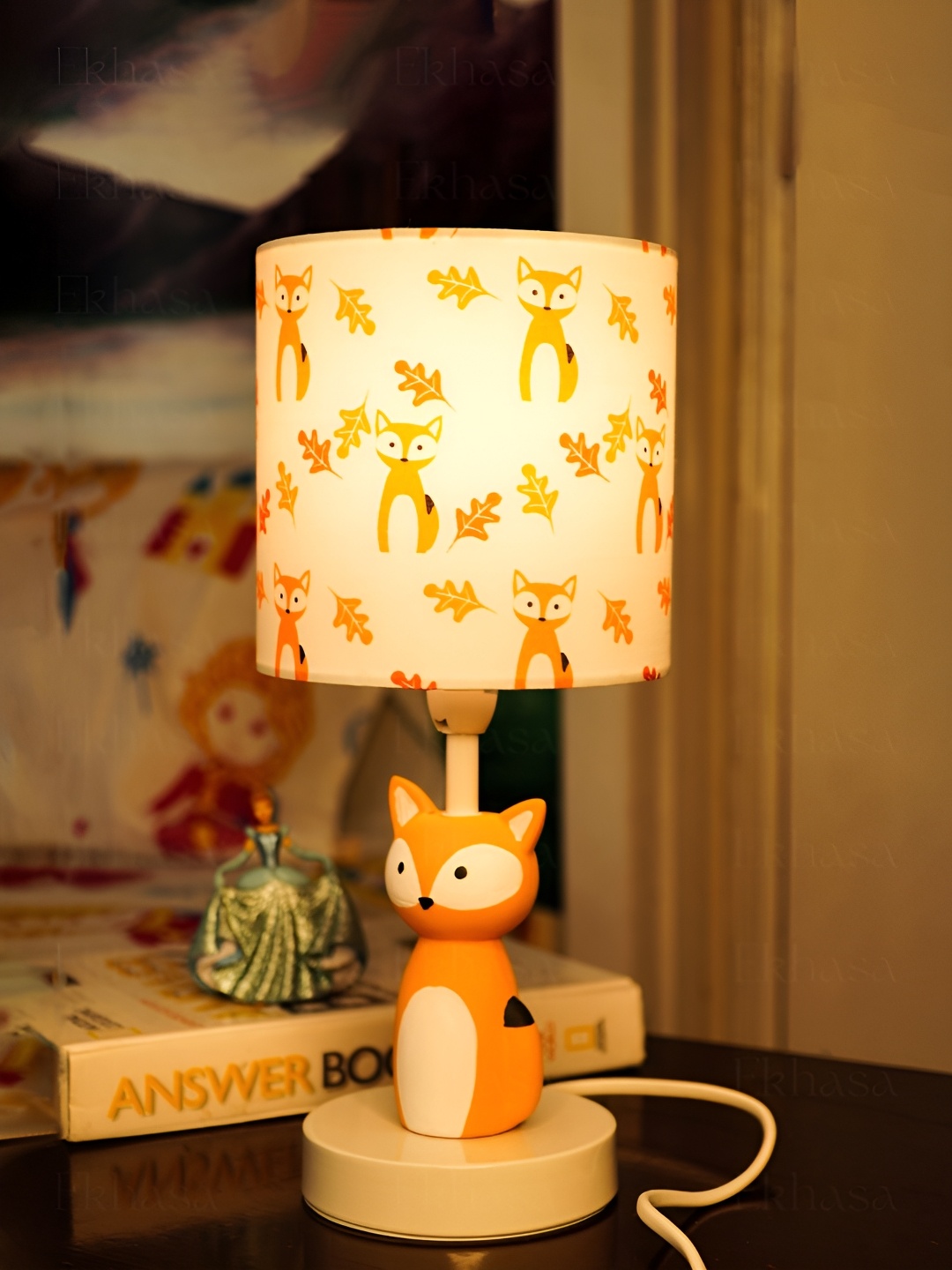 

Ekhasa Orange & White Printed Ceramic Contemporary Cylindrical Shaped Table Lamp