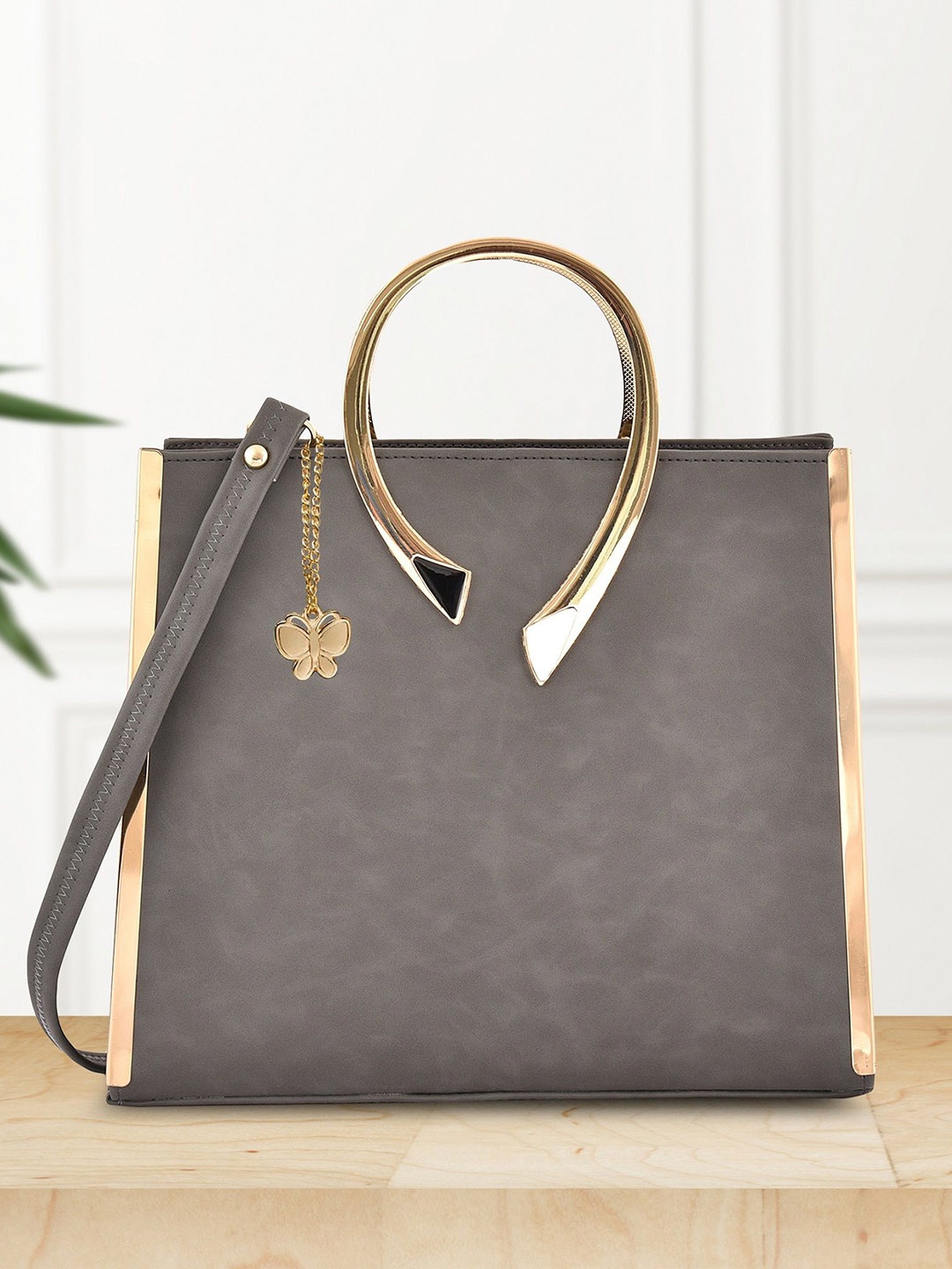 

Butterflies Solid PU Swagger Sling Bag, Grey
