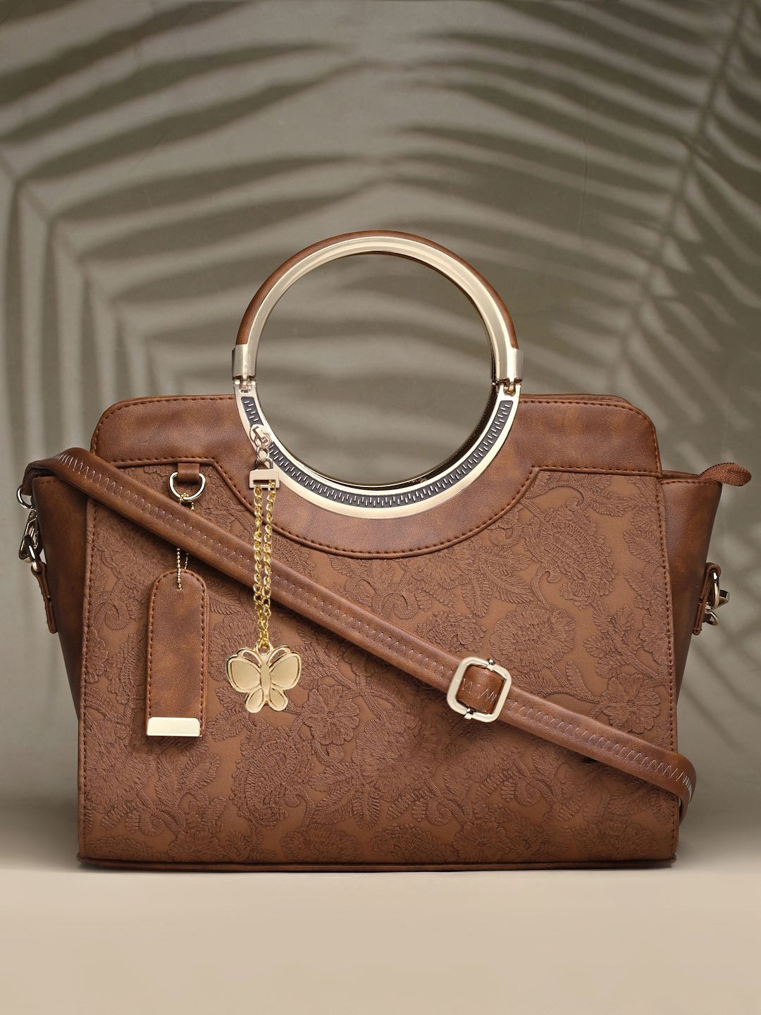 

Butterflies Solid PU Structured Handheld Bag with Tasselled, Brown