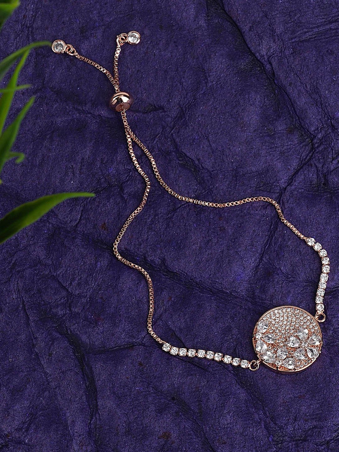 

House of Pataudi Rhodium Plated American Diamond Studded Wraparound Bracelet Rakhi, Rose gold