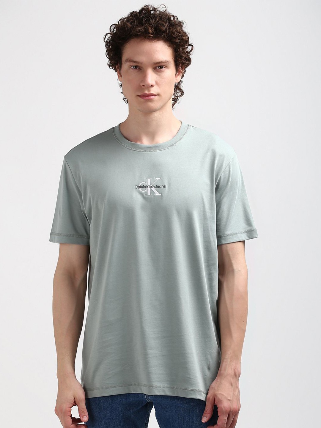 

Calvin Klein Jeans Men Typography Printed Round Neck T-shirt, Teal