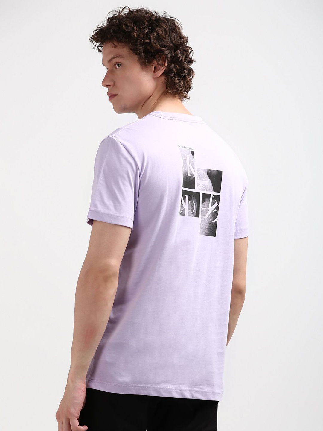 

Calvin Klein Jeans Men Round Neck Printed Cotton T-shirt, Purple