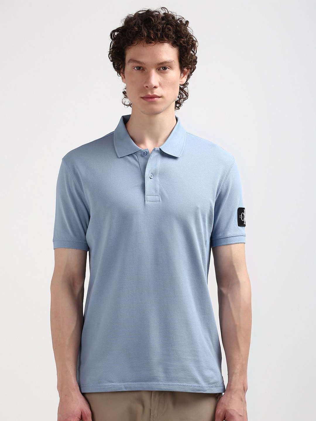 

Calvin Klein Jeans Men Polo Collar Applique Cotton T-shirt, Blue