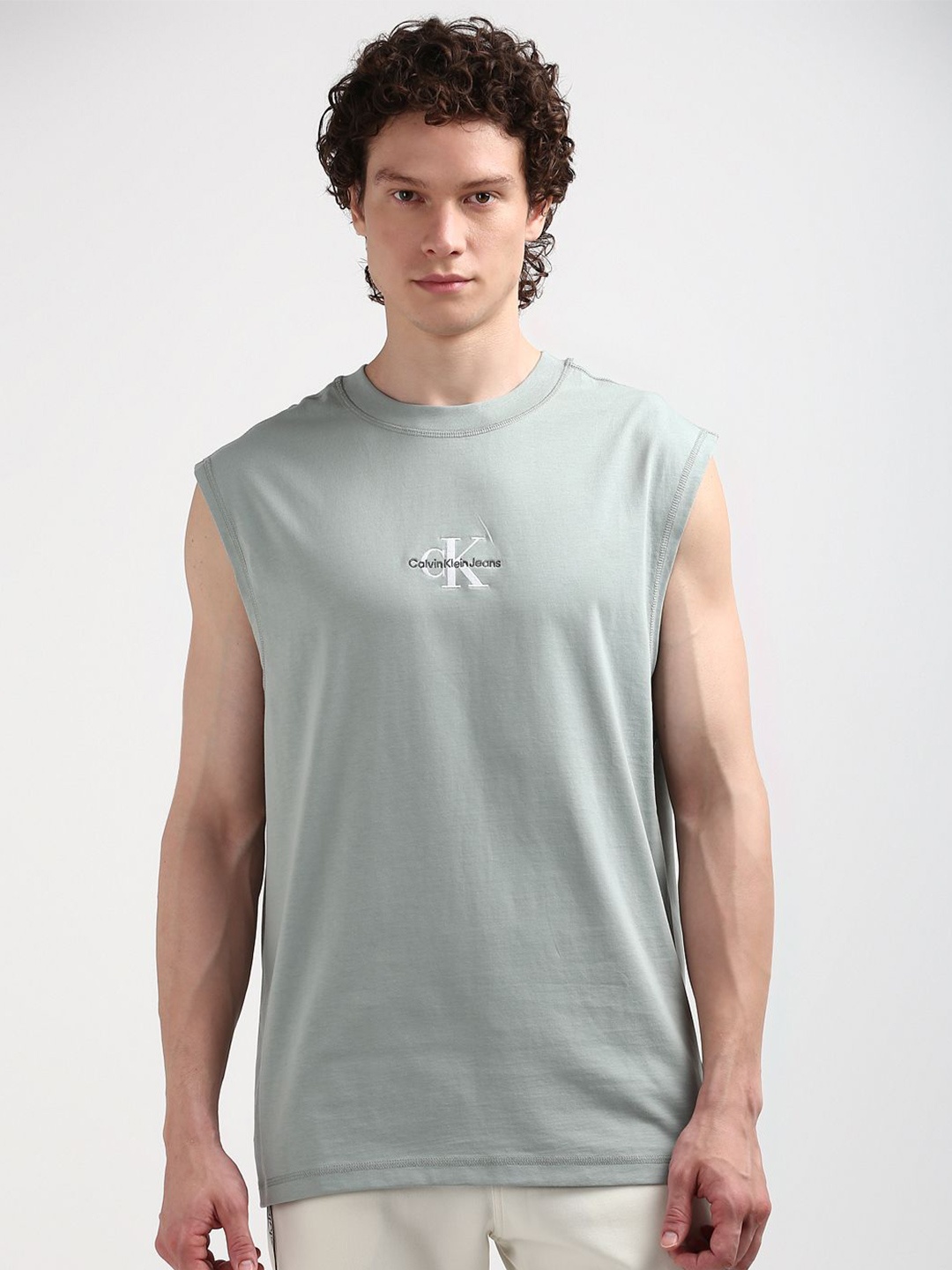 

Calvin Klein Jeans Men Typography Printed Round Neck T-shirt, Teal