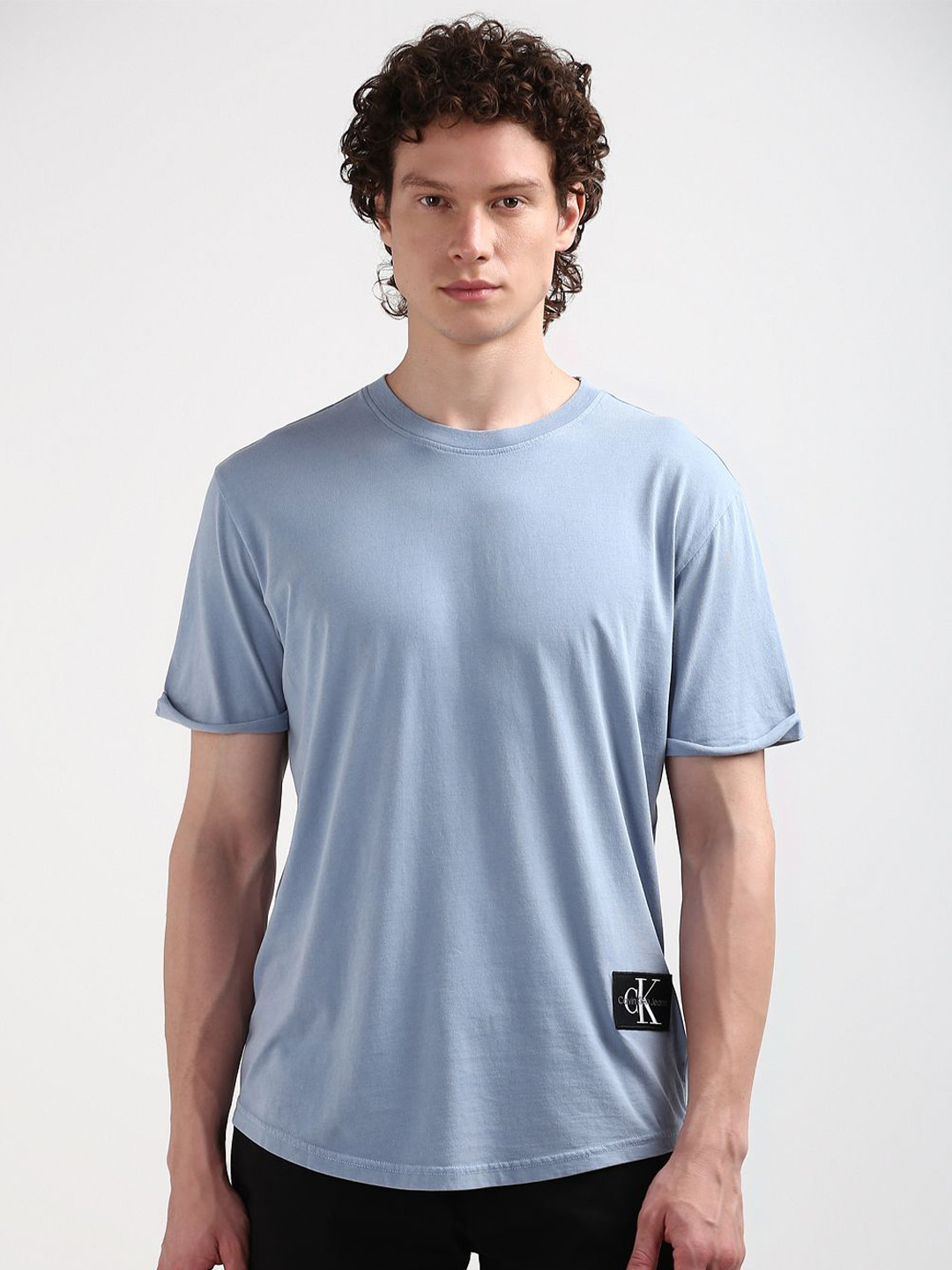 

Calvin Klein Jeans Men Round Neck Applique Cotton T-shirt, Blue