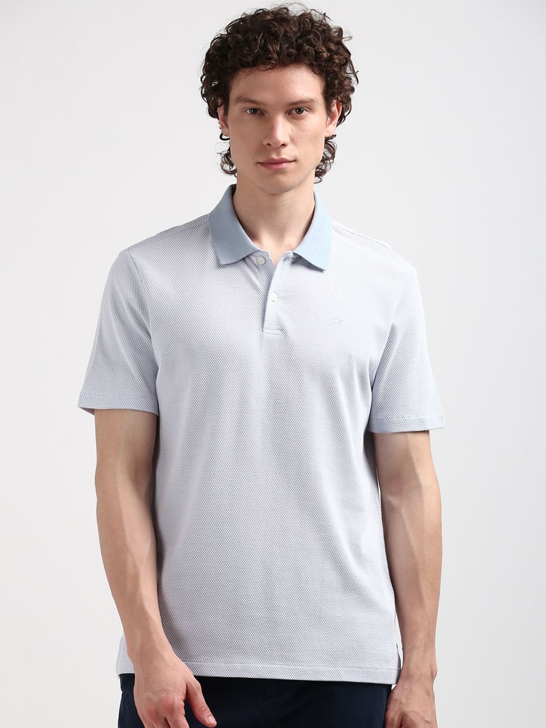 

Calvin Klein Jeans Men Polo Collar Solid T-shirt, Blue