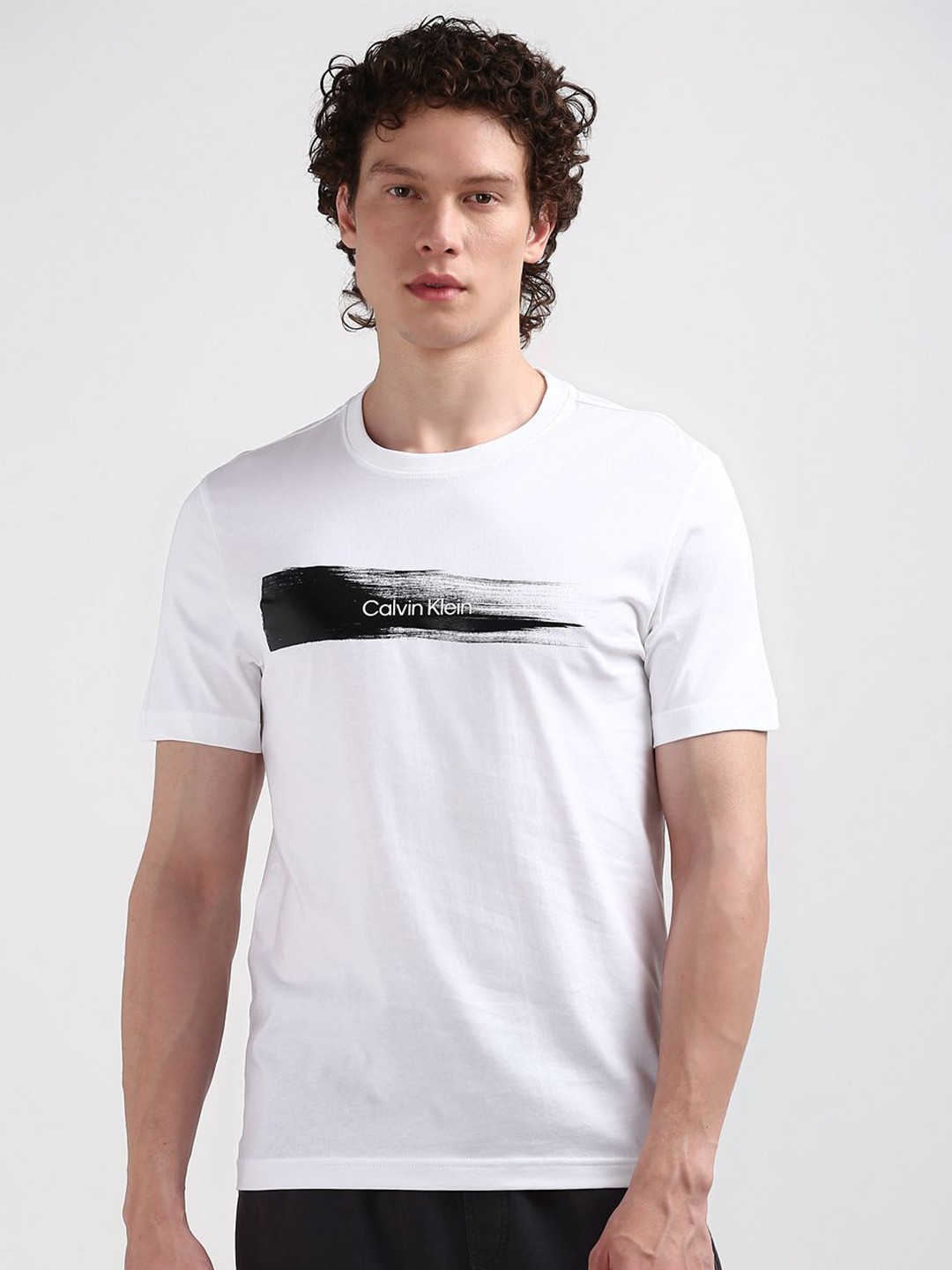 

Calvin Klein Jeans Men Round Neck Typography Printed Cotton T-shirt, White