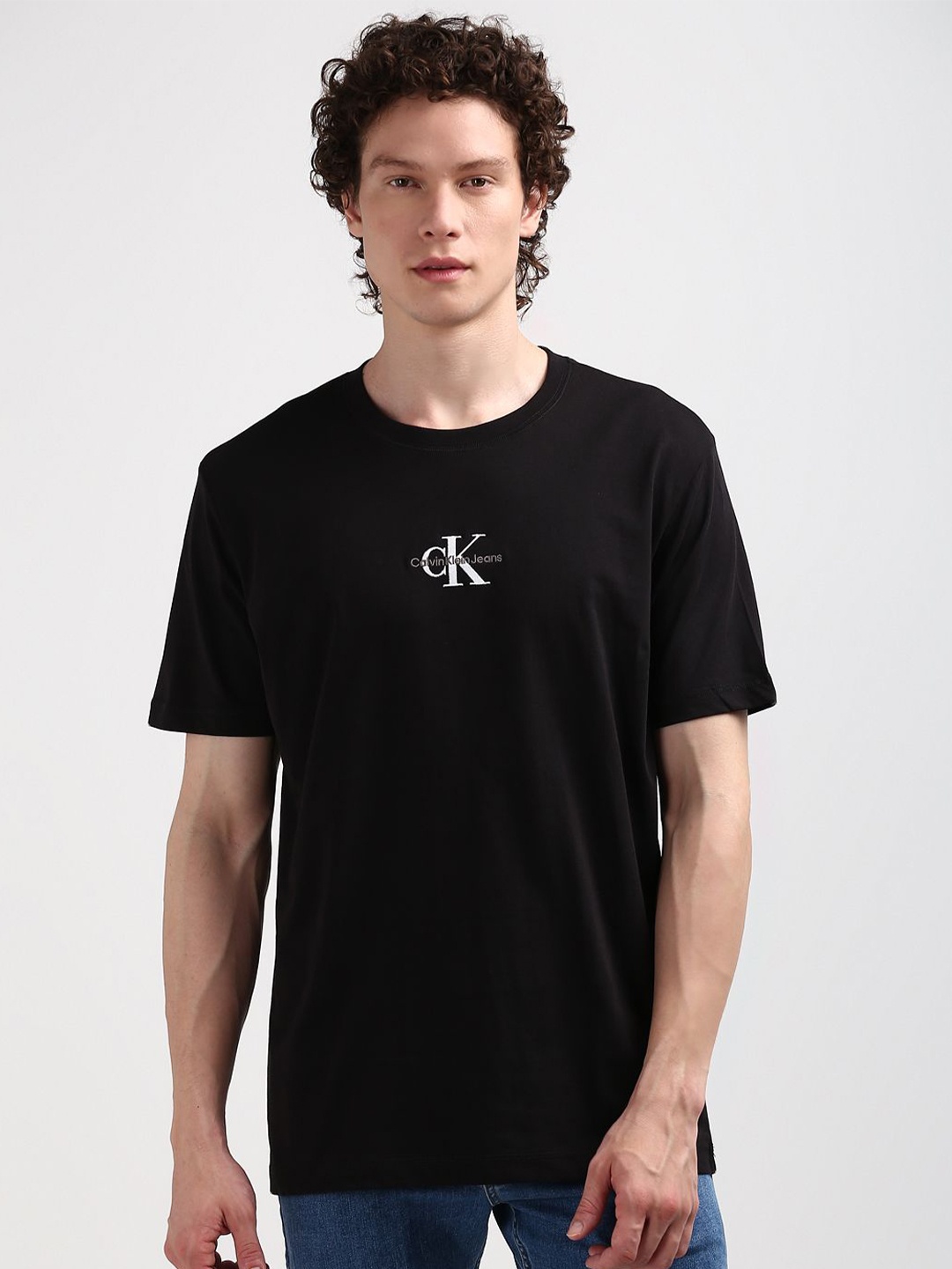 

Calvin Klein Jeans Men Typography Printed Round Neck Solid T-shirt, Black