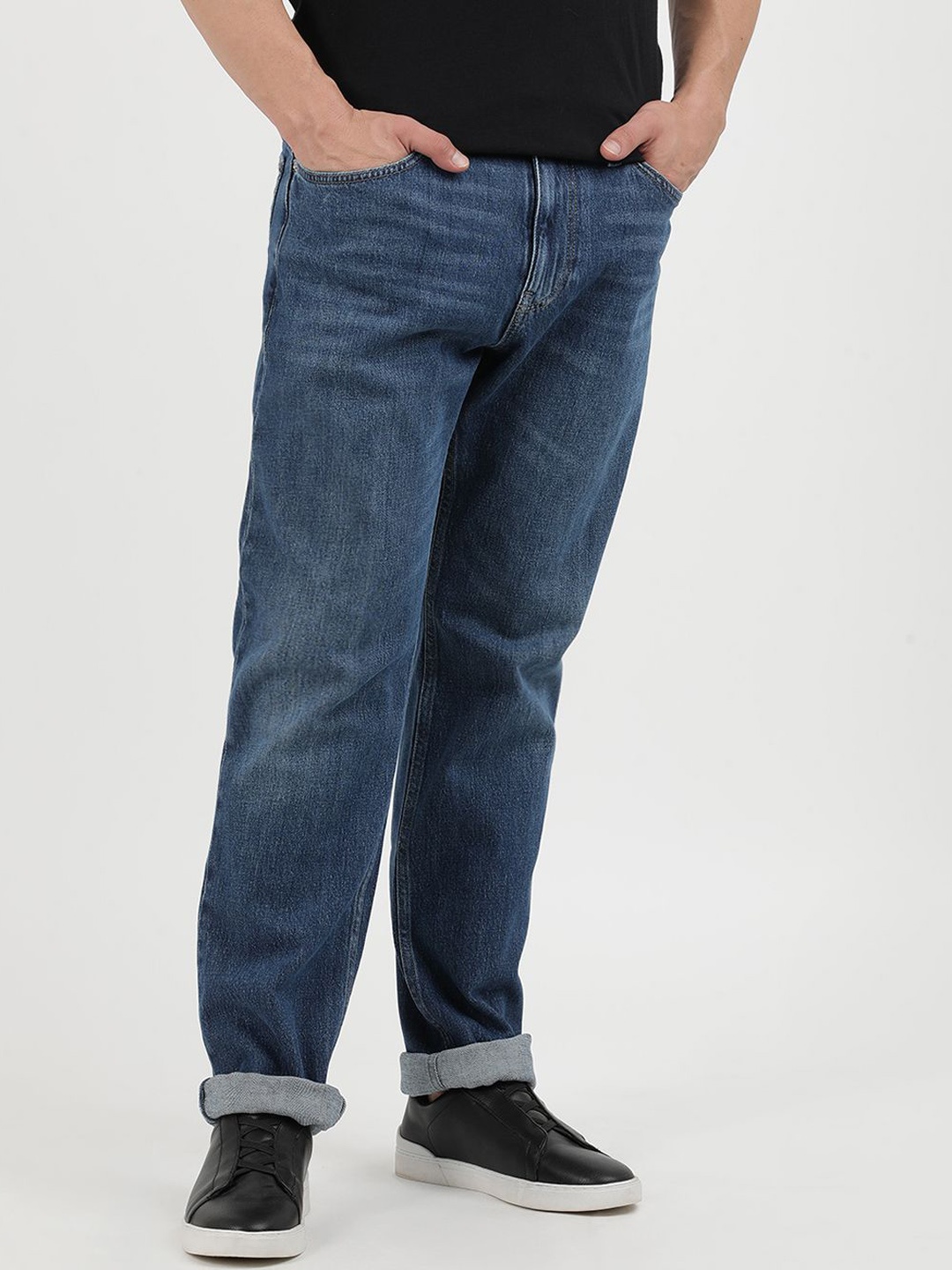 

Tommy Hilfiger Men Mid-Rise Regular Fit Jeans, Blue