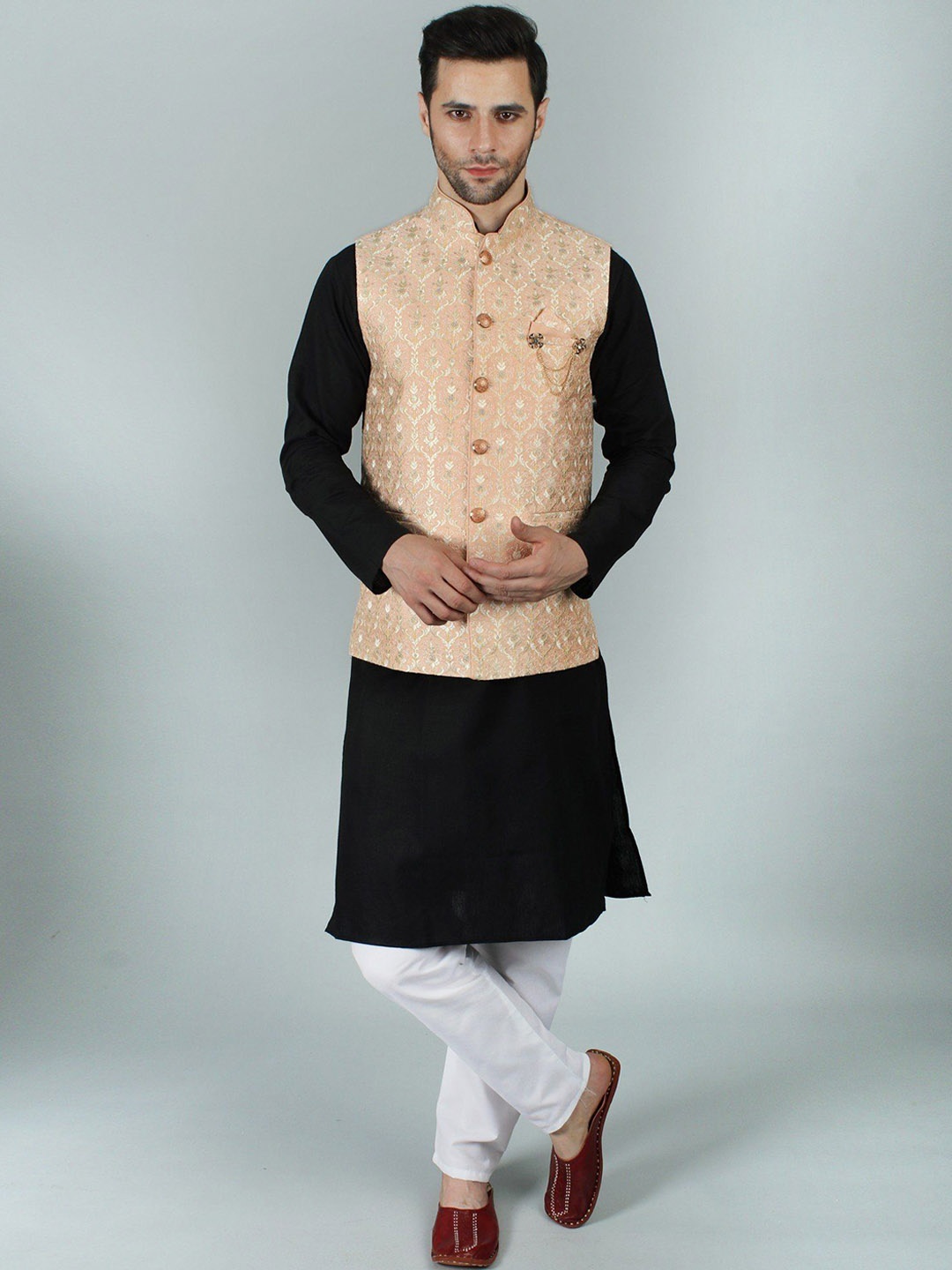 

Exotic India Elegant Jacquard Silk Modi Jacket Waist Coat with Mukaish & Thread Detailing, Peach