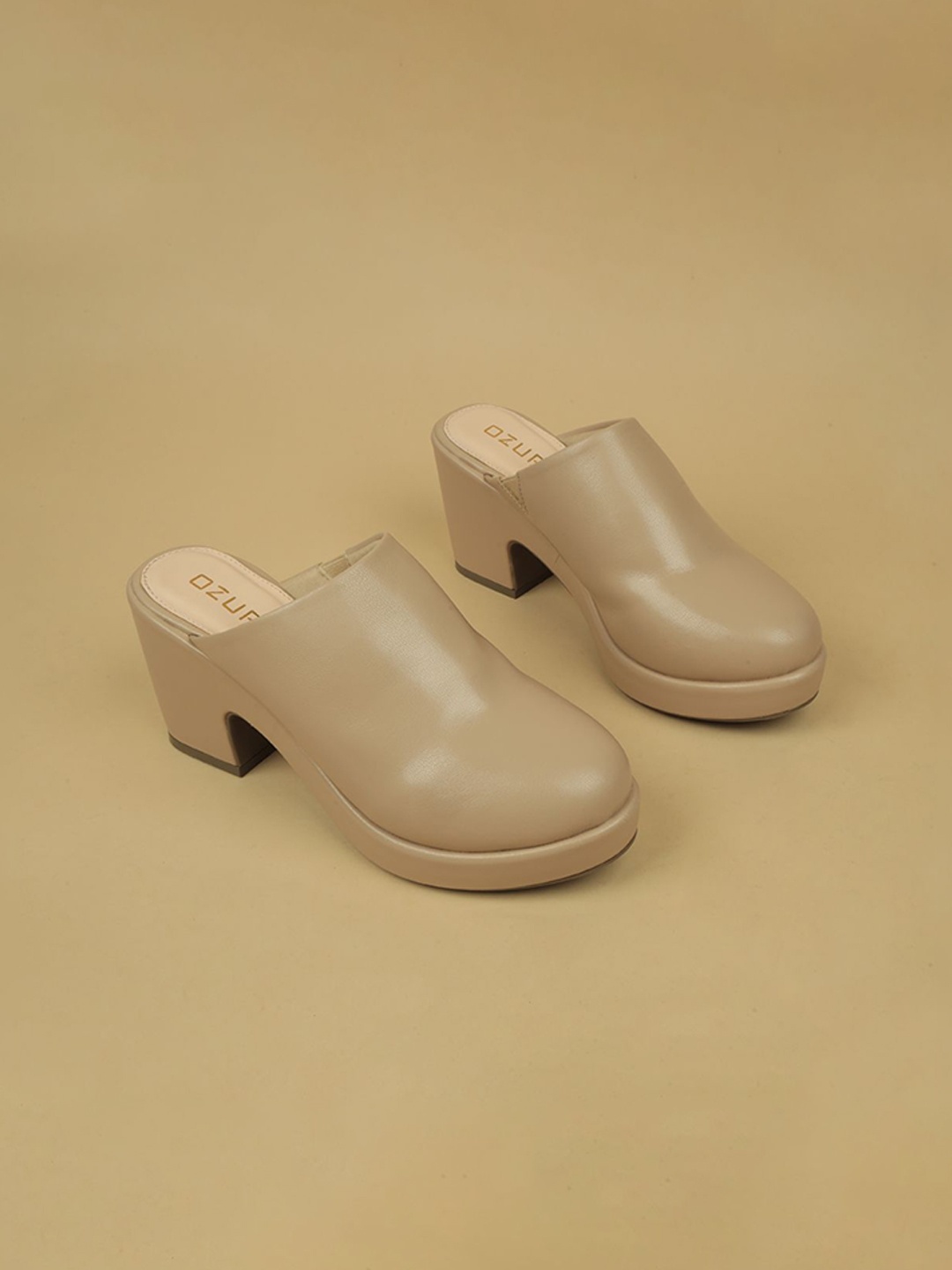 

Ozuri Block Mules with Buckles, Beige