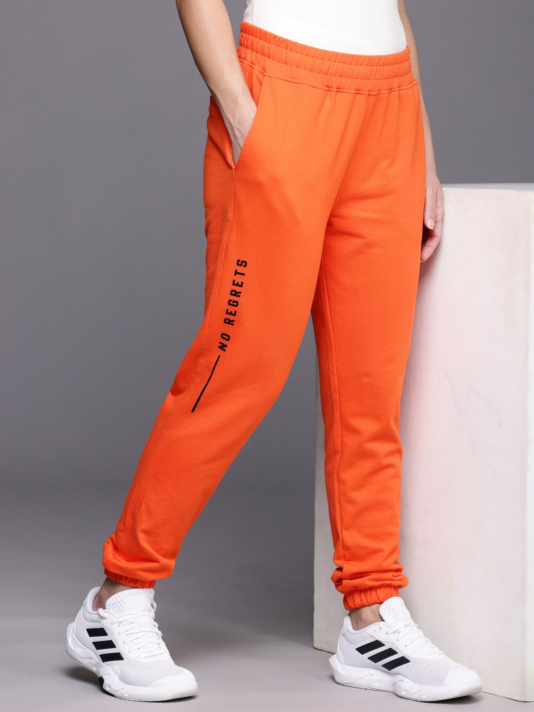 

HRX by Hrithik Roshan Lifestyle Typography Printed Pure Cotton Joggers, Orange
