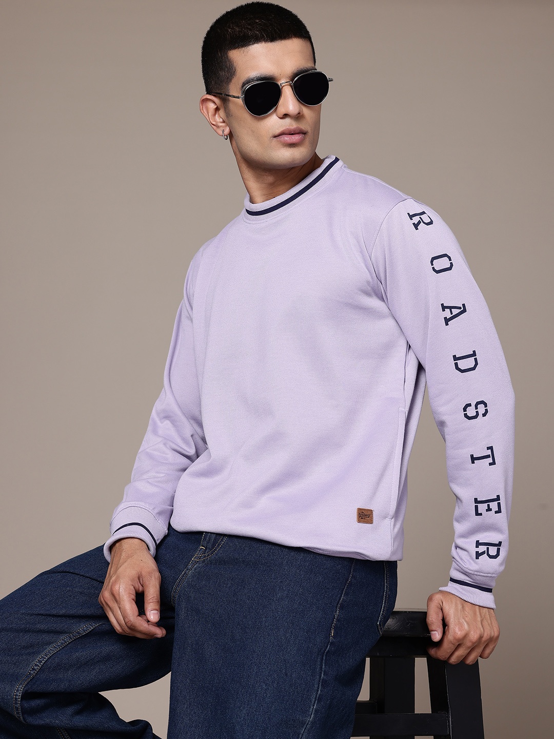 

The Roadster Lifestyle Co. Men Solid Sweatshirt, Lavender