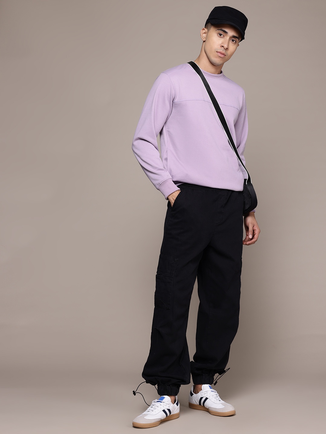 

The Roadster Lifestyle Co. Men Solid Sweatshirt, Lavender