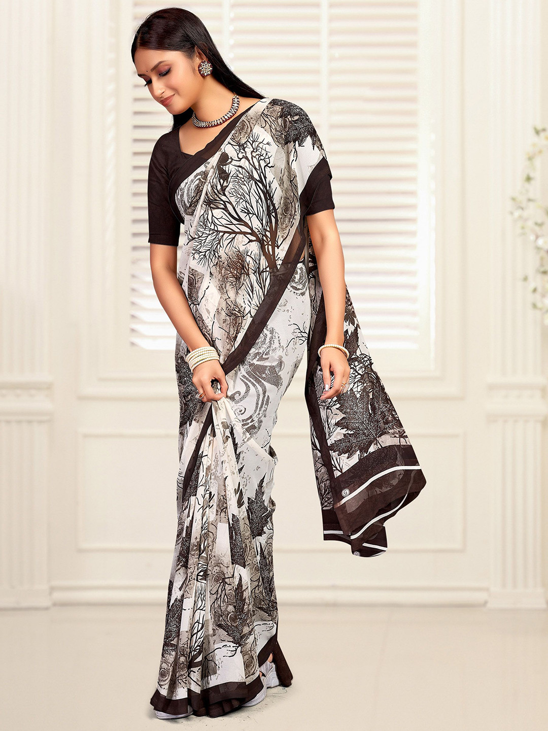 

Mitera Abstract Printed Saree, Brown