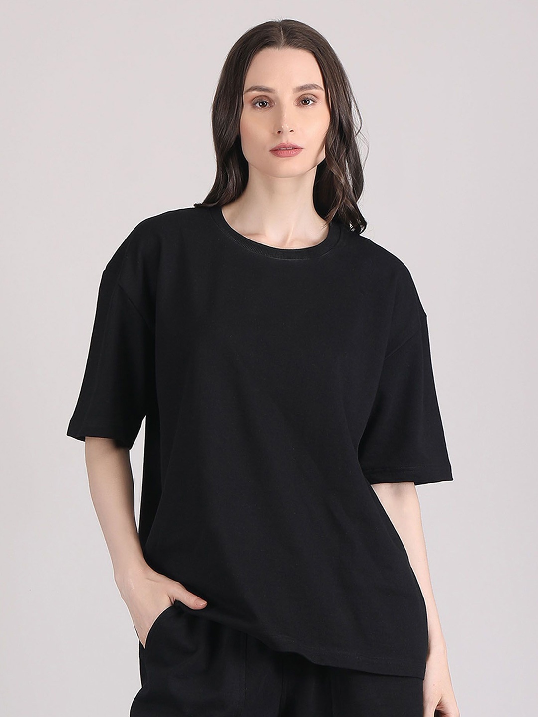 

Raxedo Women Solid Oversized T-shirt, Black