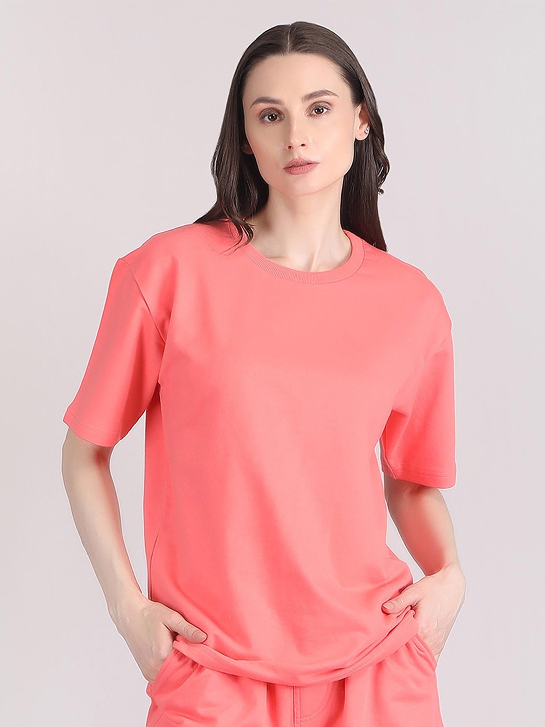 

Raxedo Women Solid Oversized T-shirt, Pink