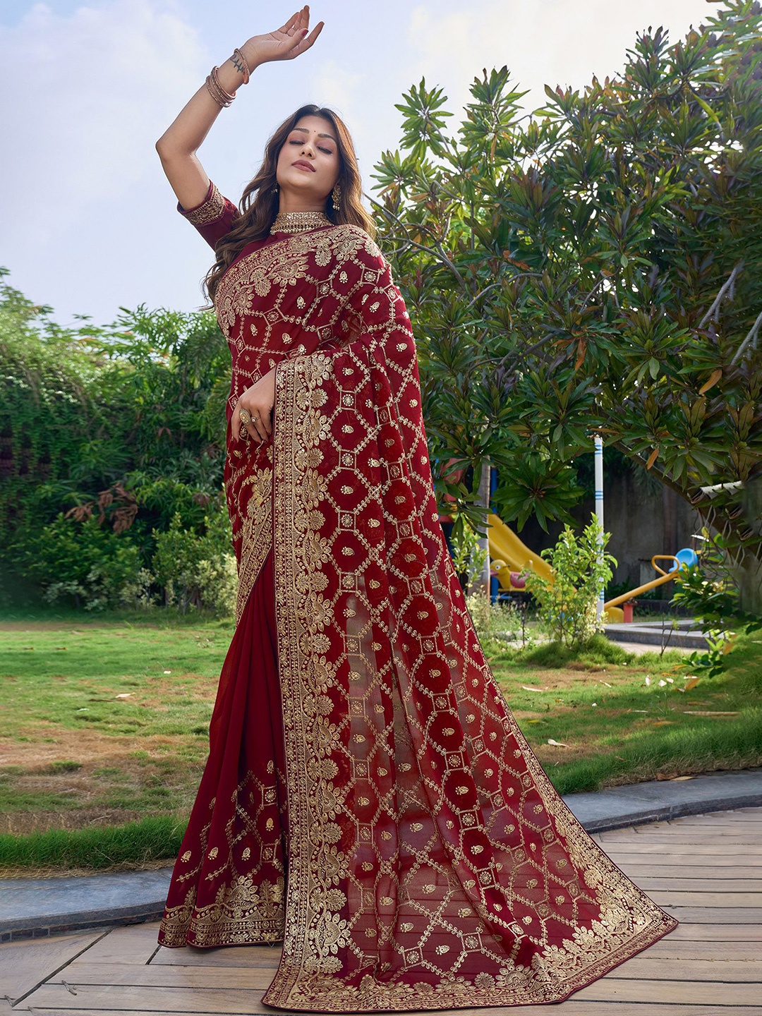 

Kedar Fab Aari Work Embellished Poly Georgette Saree, Maroon