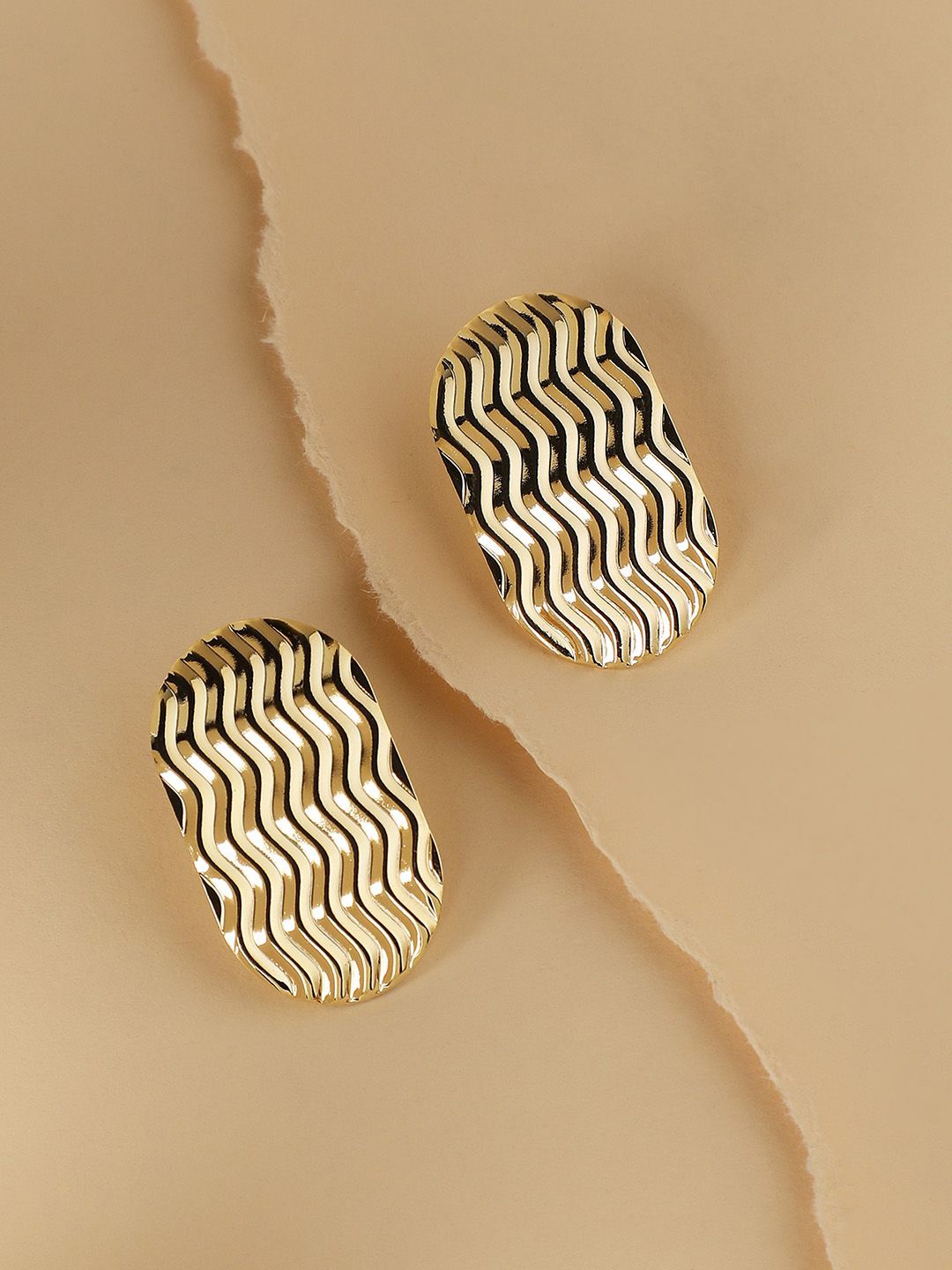 

SOHI Gold-Plated Contemporary Stud Earrings