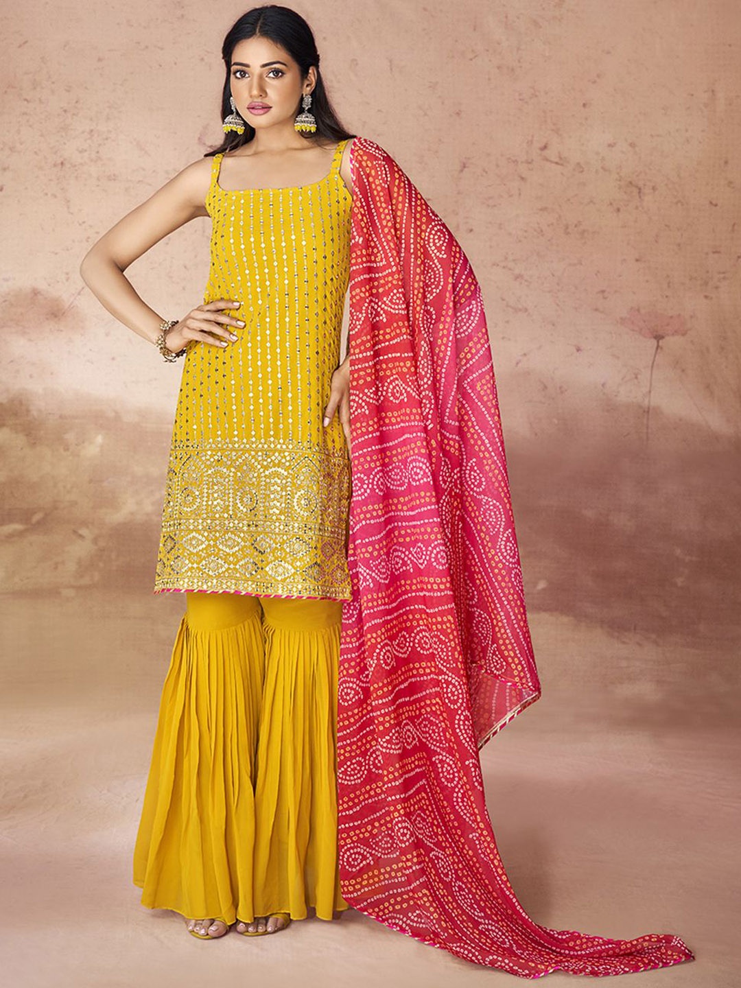 

Fusionic Women Ethnic Motifs Embroidered Regular Sequinned Kurta with Sharara & With Dupatta, Mustard