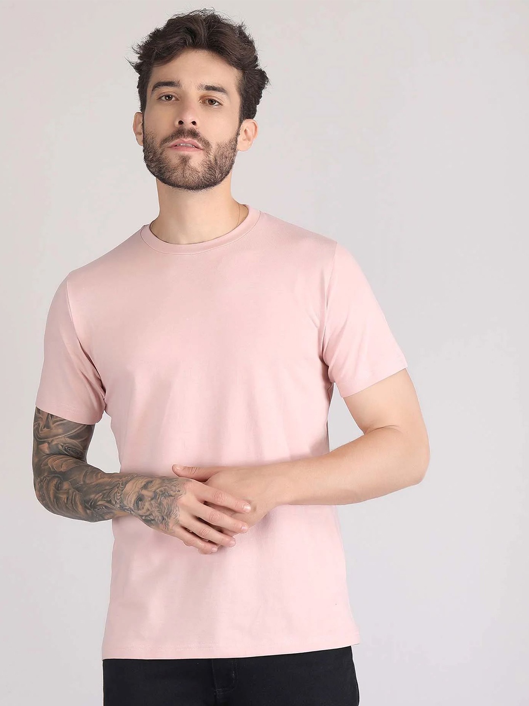 

Raxedo Men Solid Round Neck T-shirt, Peach