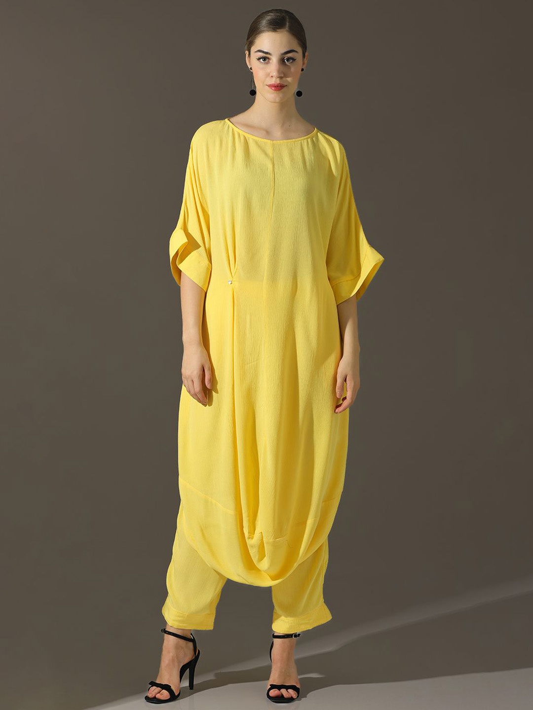 

Dora Dori Relaxed Fit Solid Round neck A-Line Cowl Kurta & Trouser Sets, Yellow