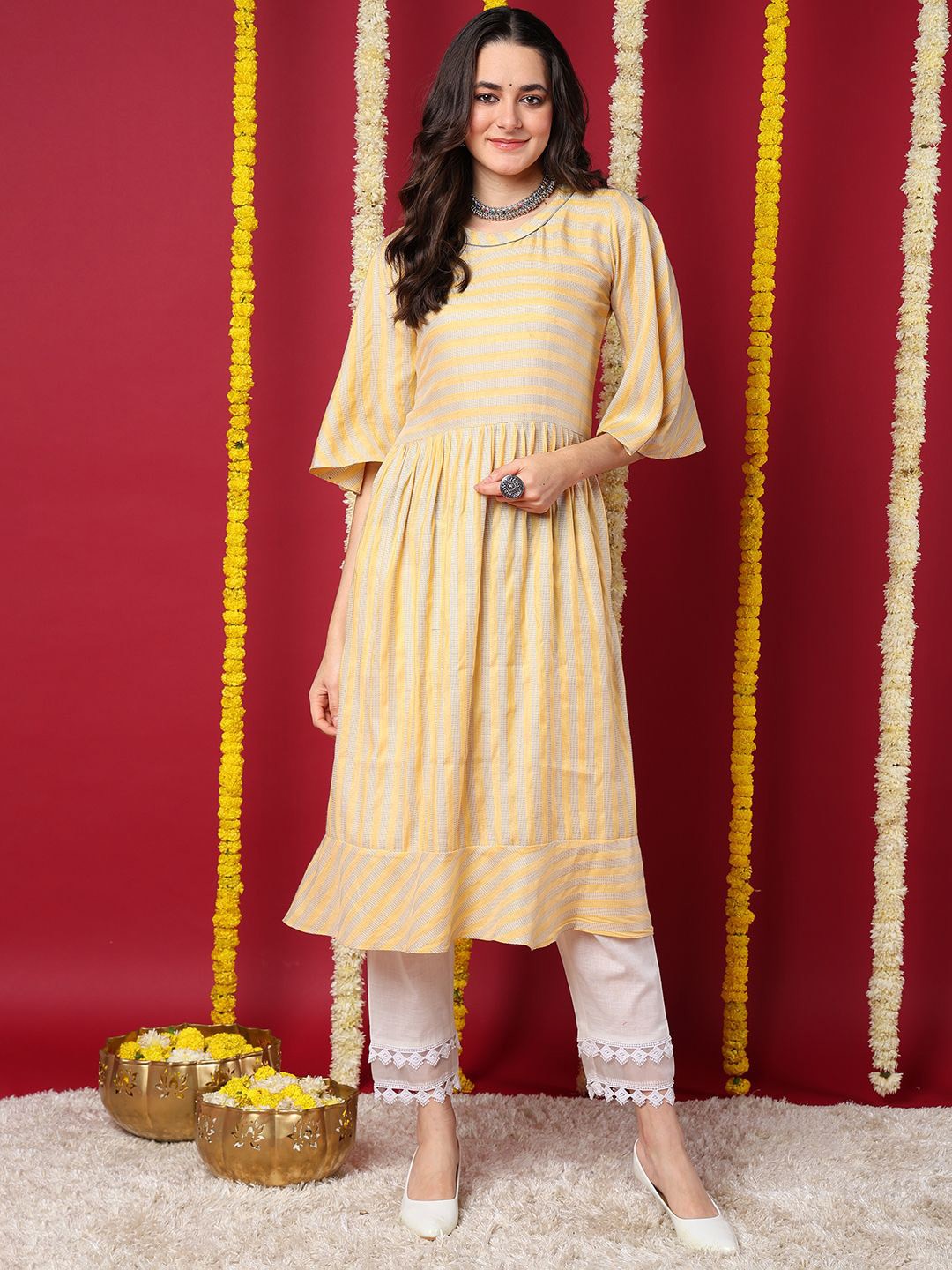 

KALINI Women Ethnic Motifs Yoke Design Flared Sleeves Kurta, Yellow