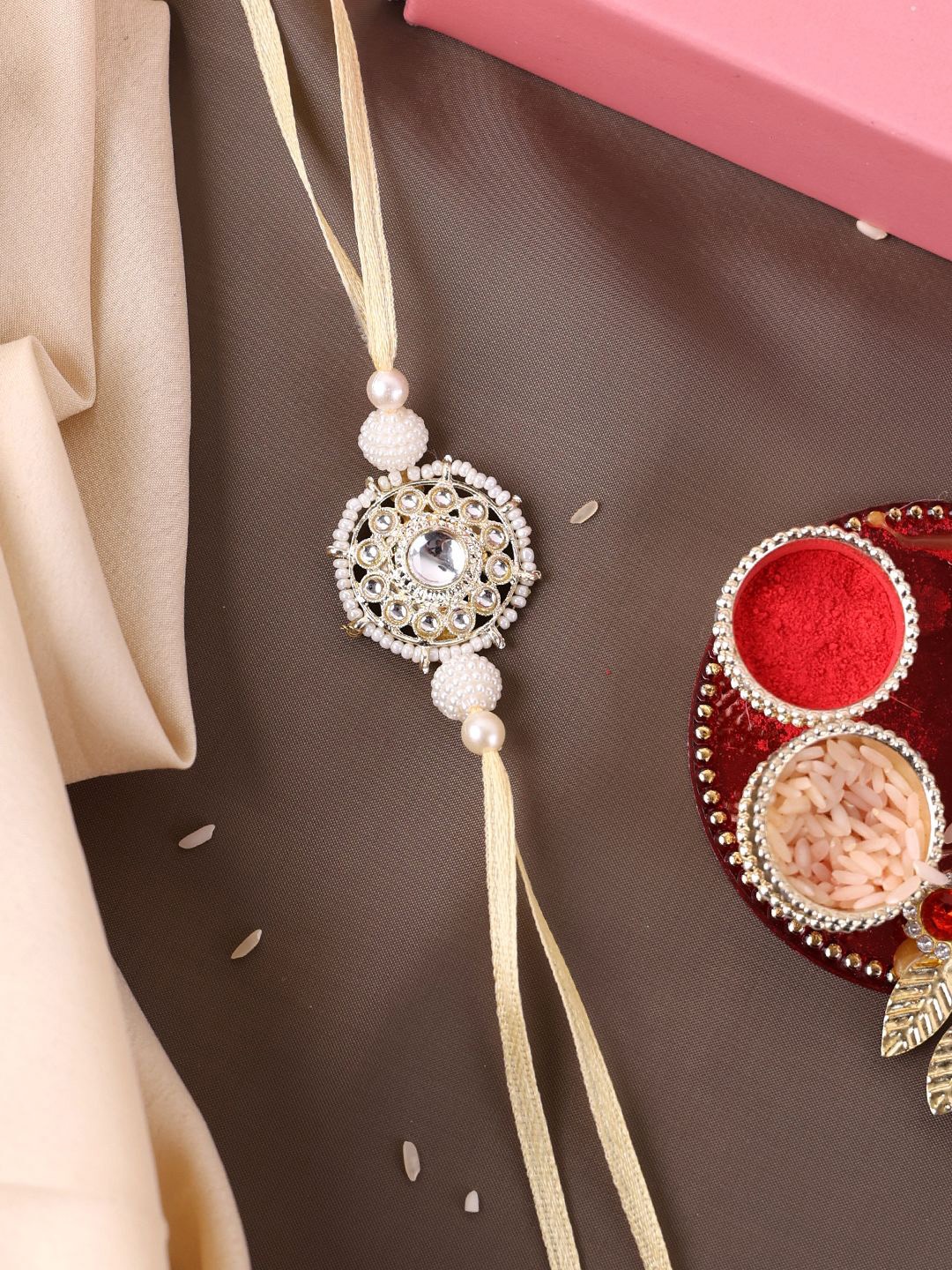 

PANASH Gold Plated Beaded & Stone Studded Rakhi With Roli Chawal