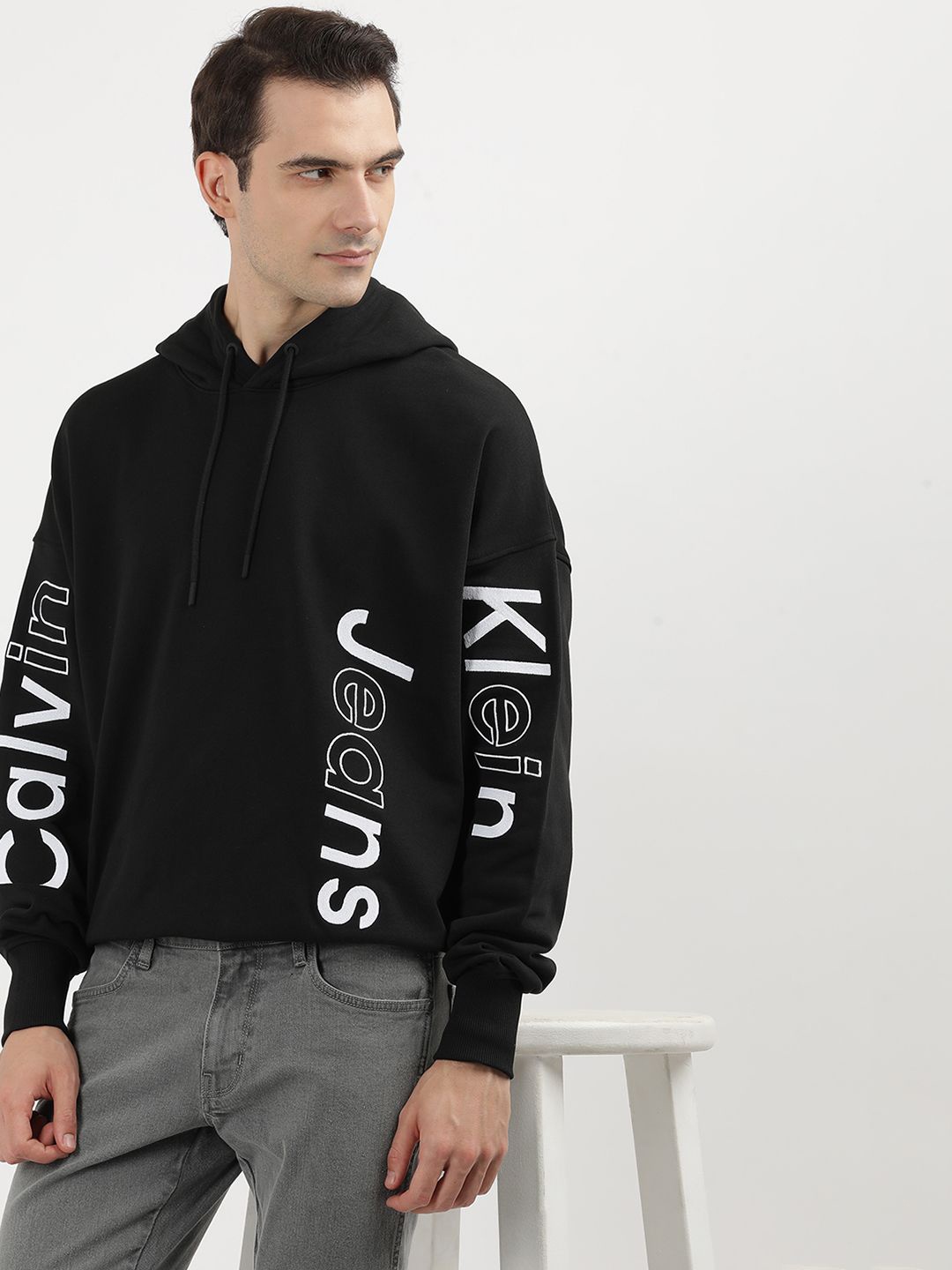 

Calvin Klein Jeans Printed Hooded Cotton Pullover Sweatshirt, Black