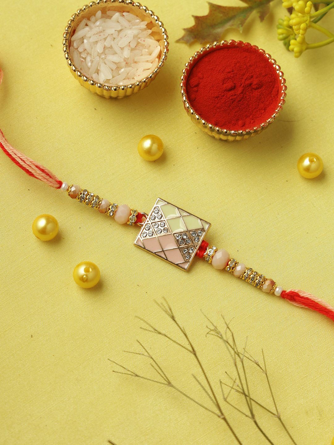 

Aapno Rajasthan Stone Studded & Beaded Rakhi With Roli Chawal & Greetings Card, Cream