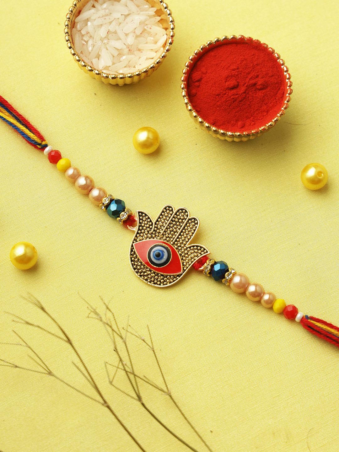 

Aapno Rajasthan Hand of Protection Rakhi with Roli Chawal & Greeting Card, Red