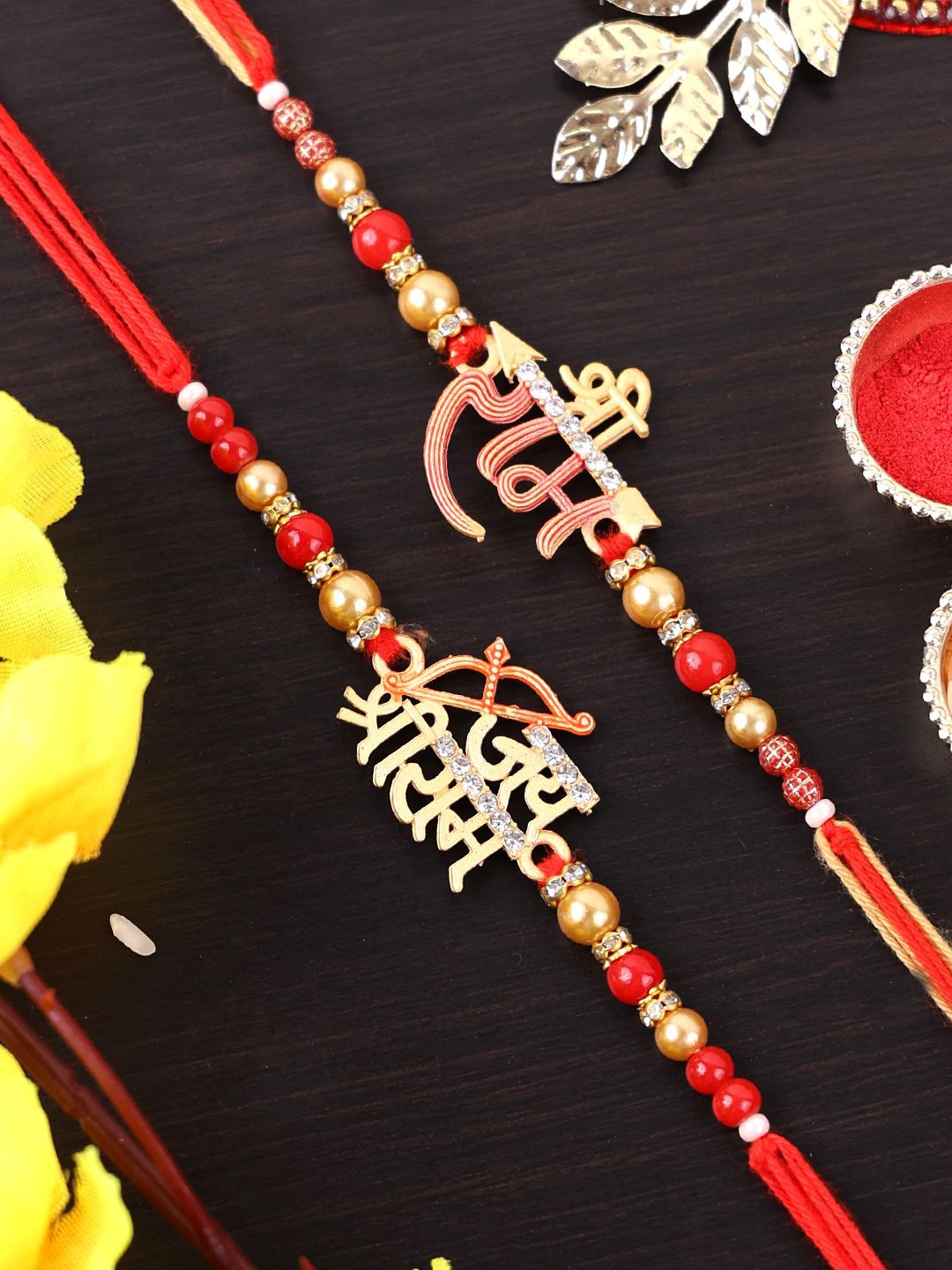 

PANASH Set Of 2 Gold-Plated Name of Shri Ram Rakhis With Roli Chawal