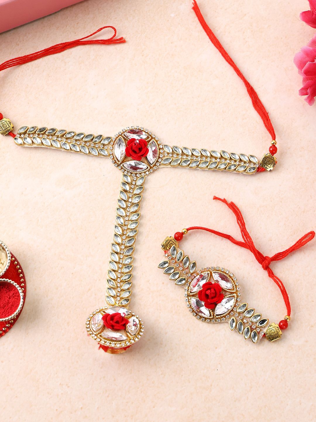 

PANASH Gold Plated Floral Shpaed Thread Bhaiya Bhabhi Rakhis With Roli Chawal