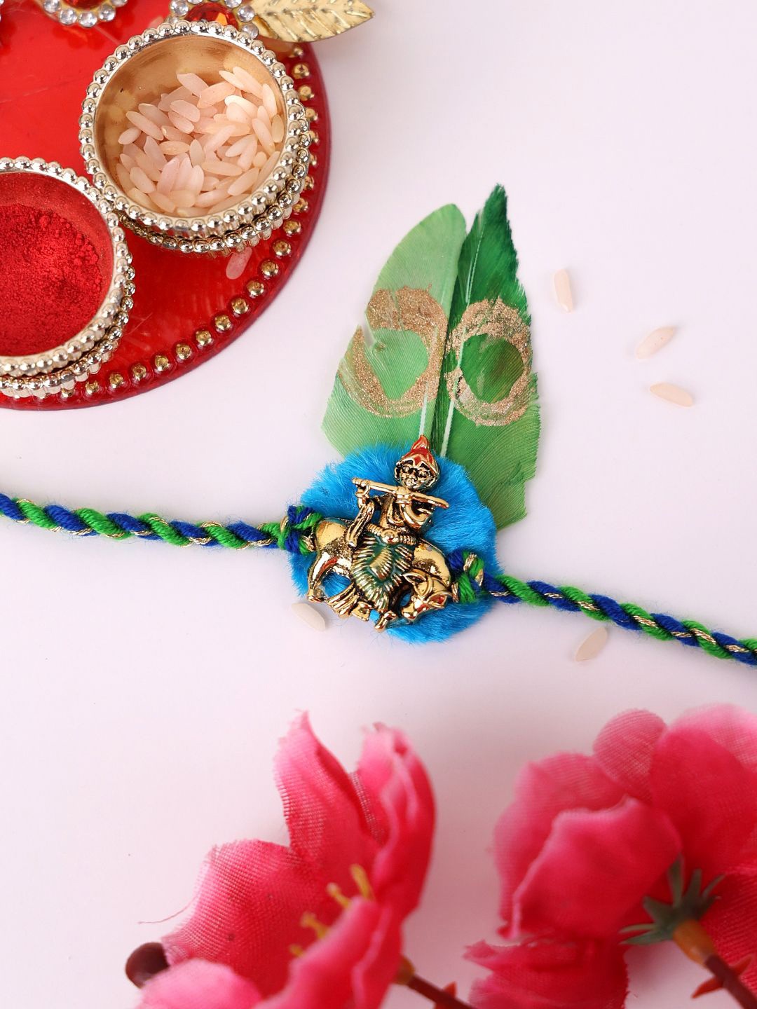 

PANASH Silver Plated Krishan Temple Shaped Thread Rakhi With Roli Chawal, Blue