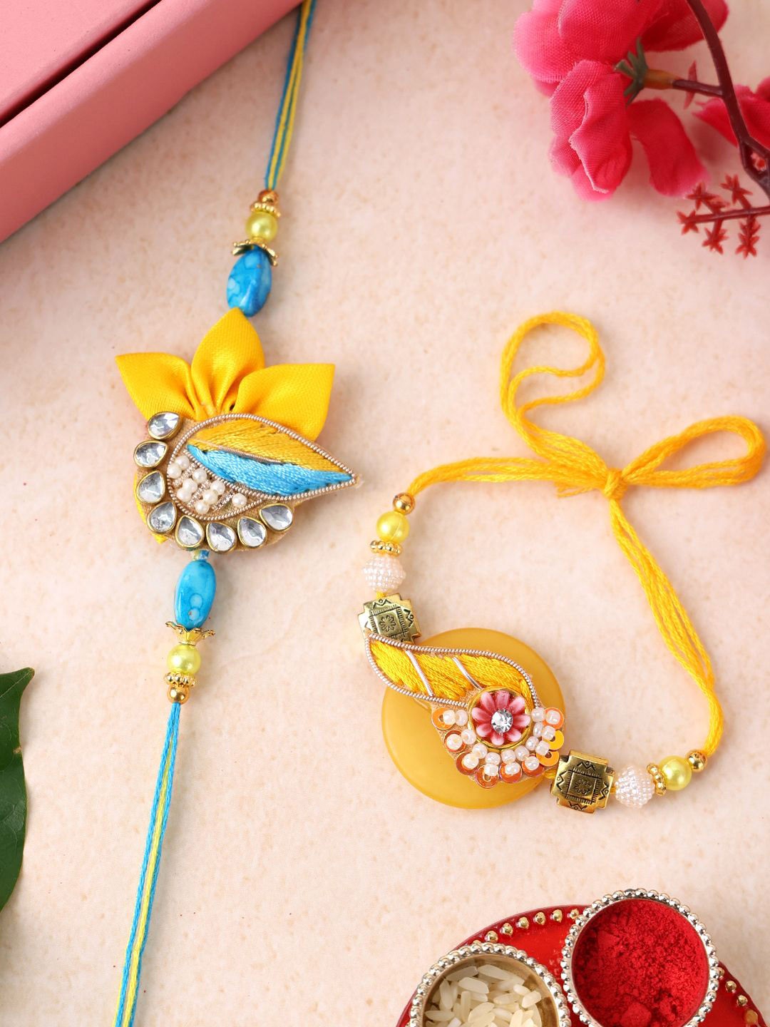 

PANASH Set Of 2 Gold Plated Stone Studded Thread Rakhis With Roli Chawal