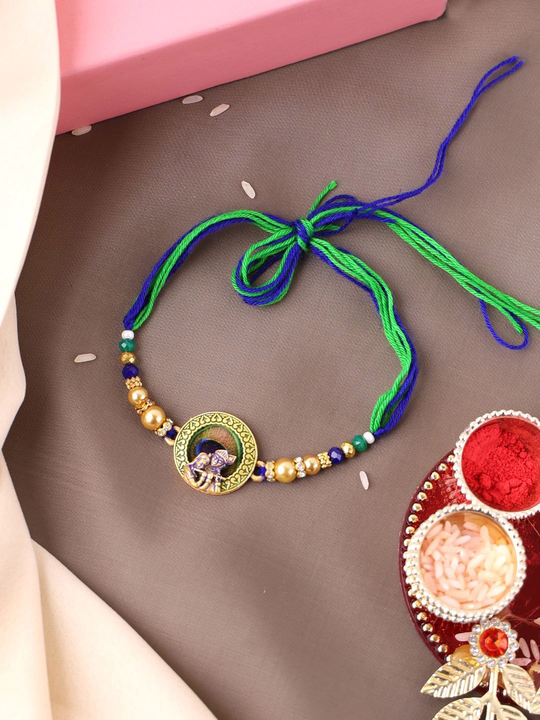 

PANASH Gold-Plated Beaded Rakhi With Roli Chawal
