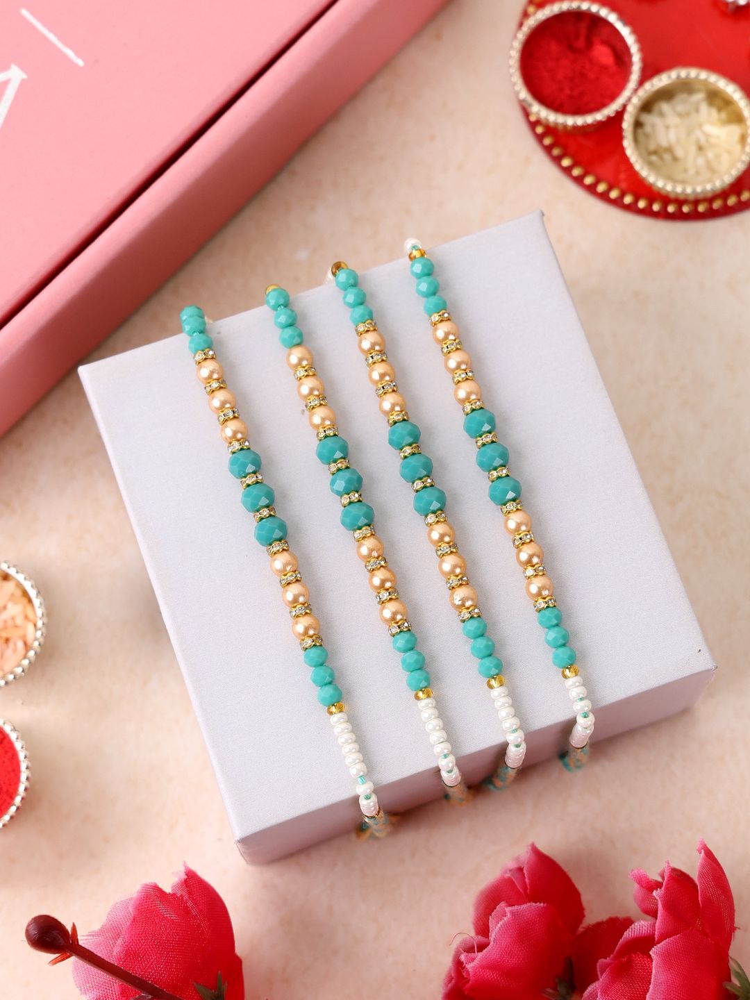

PANASH Set Of 4 Gold Plated Beaded Thread Rakhis With Roli Chawal