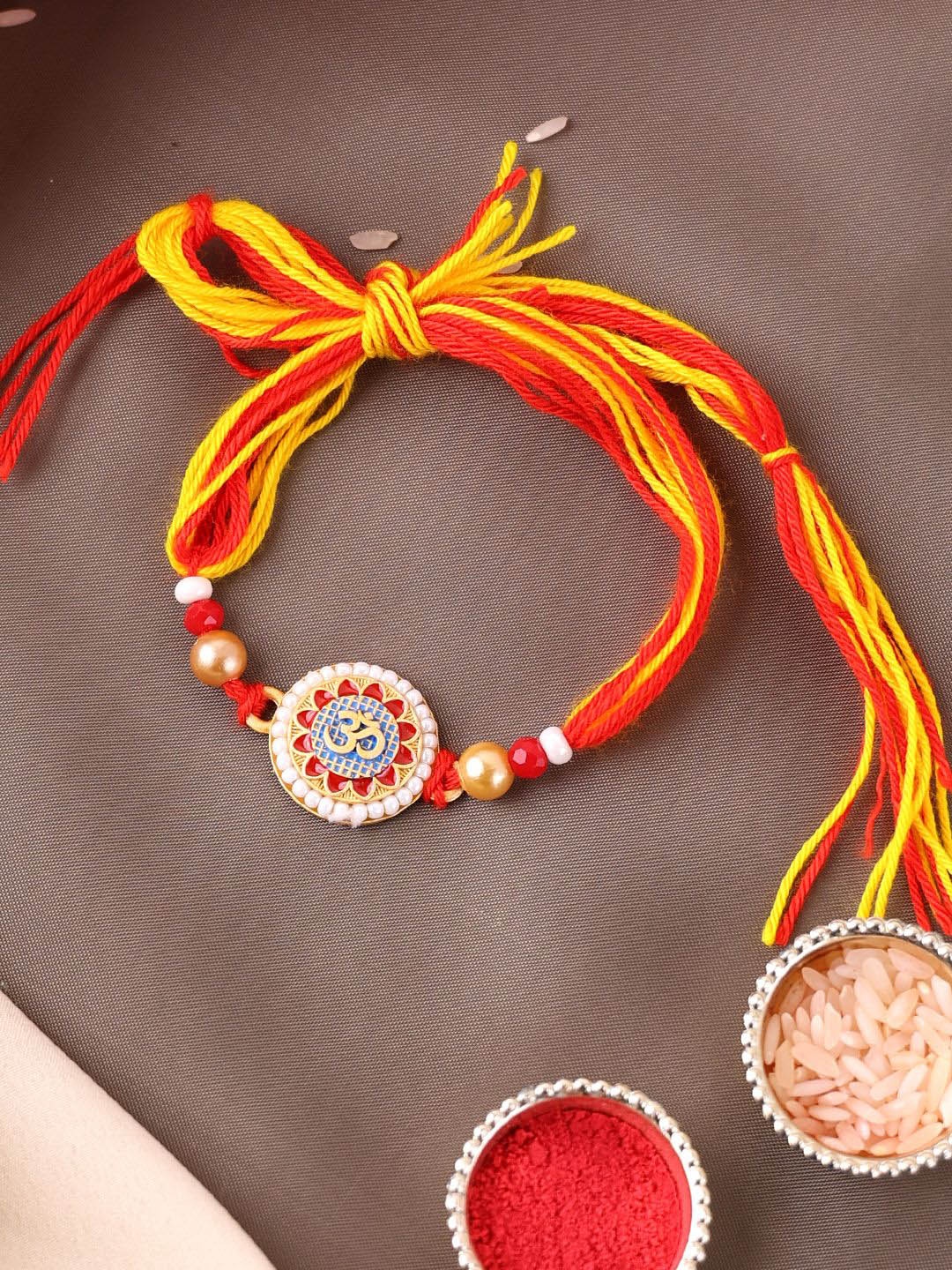 

PANASH Gold-Plated Om Shaped Beaded Thread Rakhi