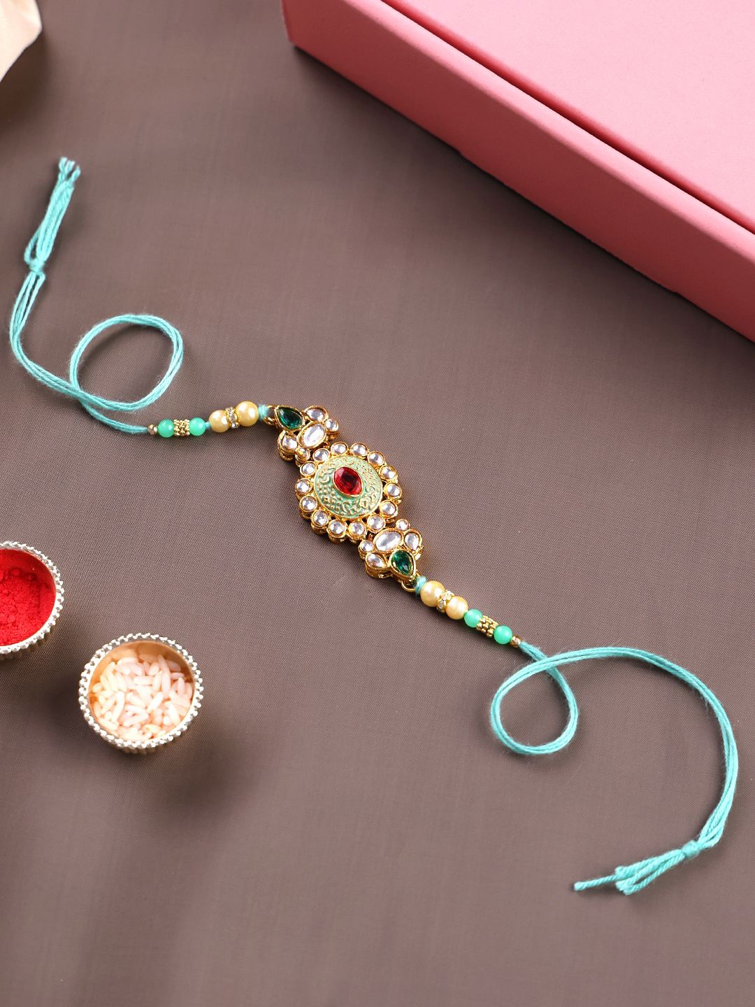 

PANASH Gold Plated Thread Rakhi With Roli Chawal