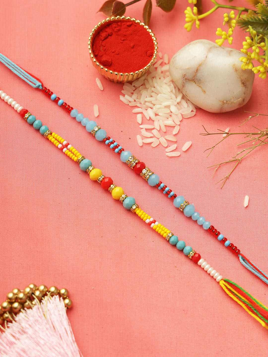 

Aapno Rajasthan Set of 2 Beaded Rakhi with Roli Chawal & Greeting Card, Yellow