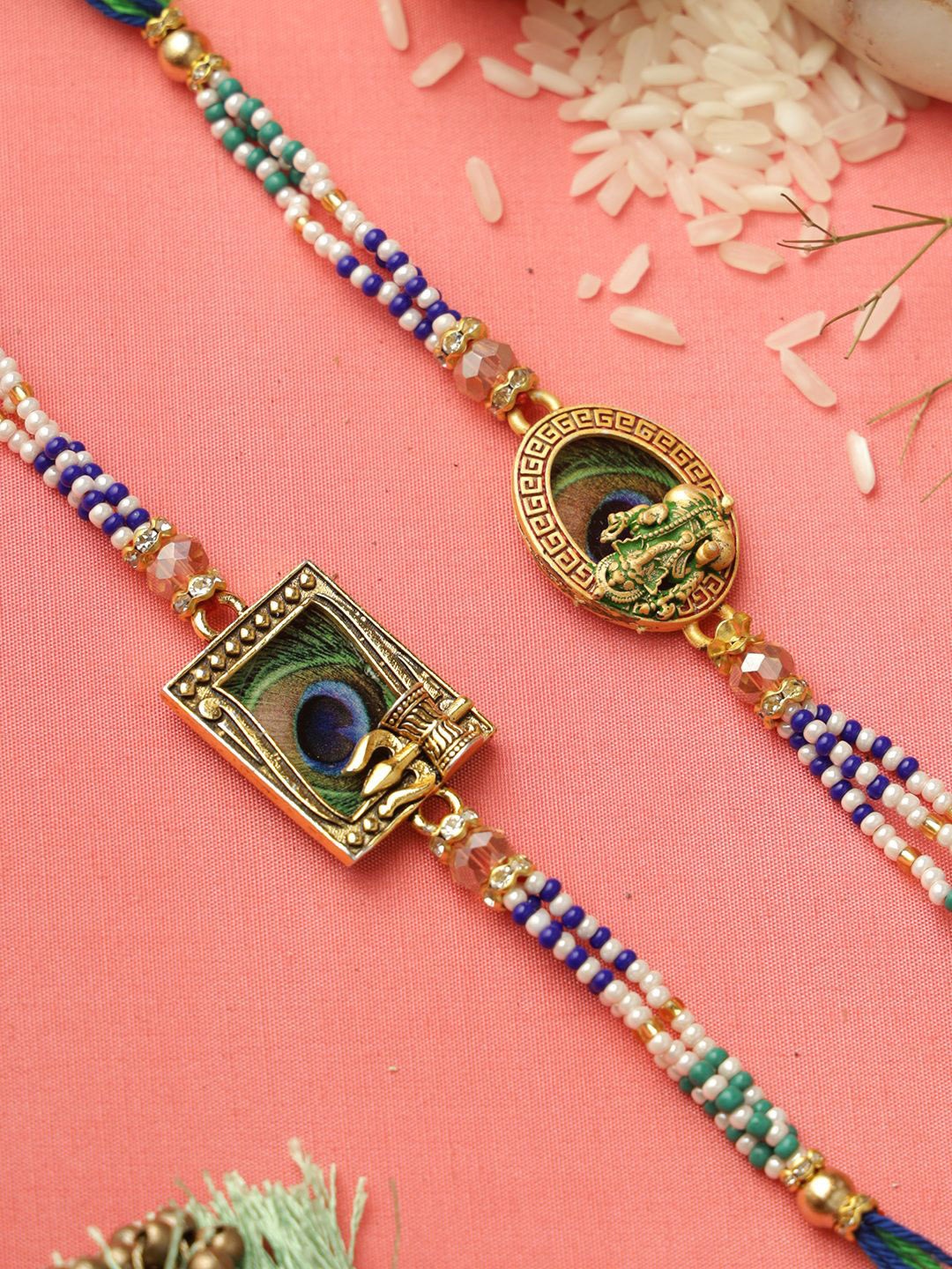 

Aapno Rajasthan Set of 2 Peacock & Krisha Shiva Rakhi with Roli Chawal & Greeting Card, Green