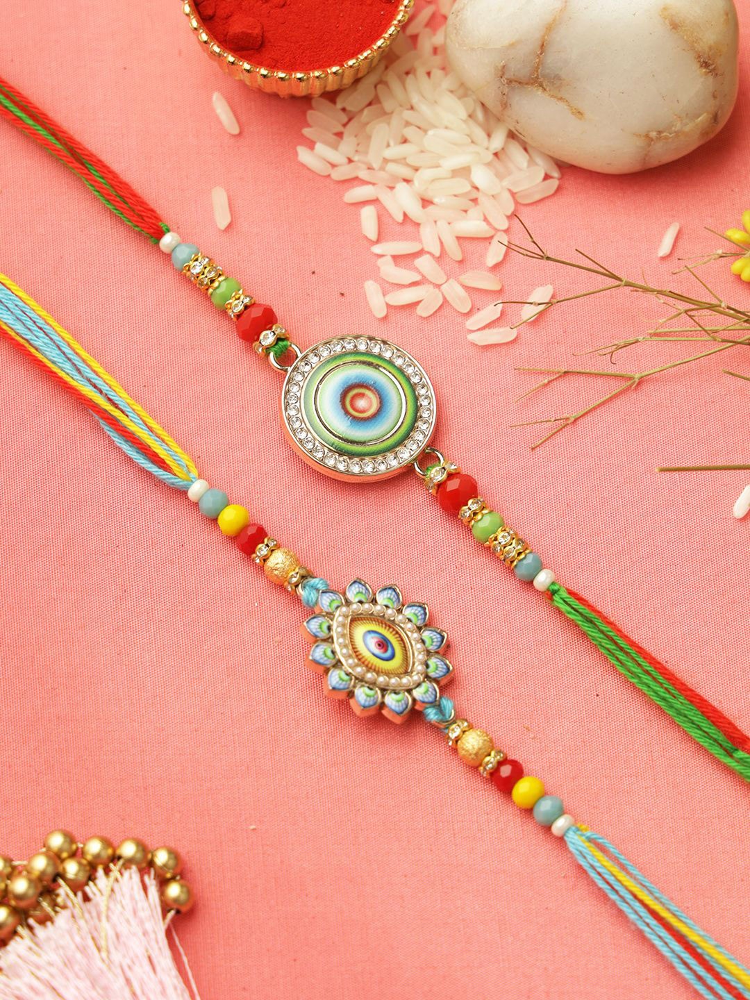 

Aapno Rajasthan Set of 2 Enameled Rakhi with Roli Chawal & Greeting Card, Green