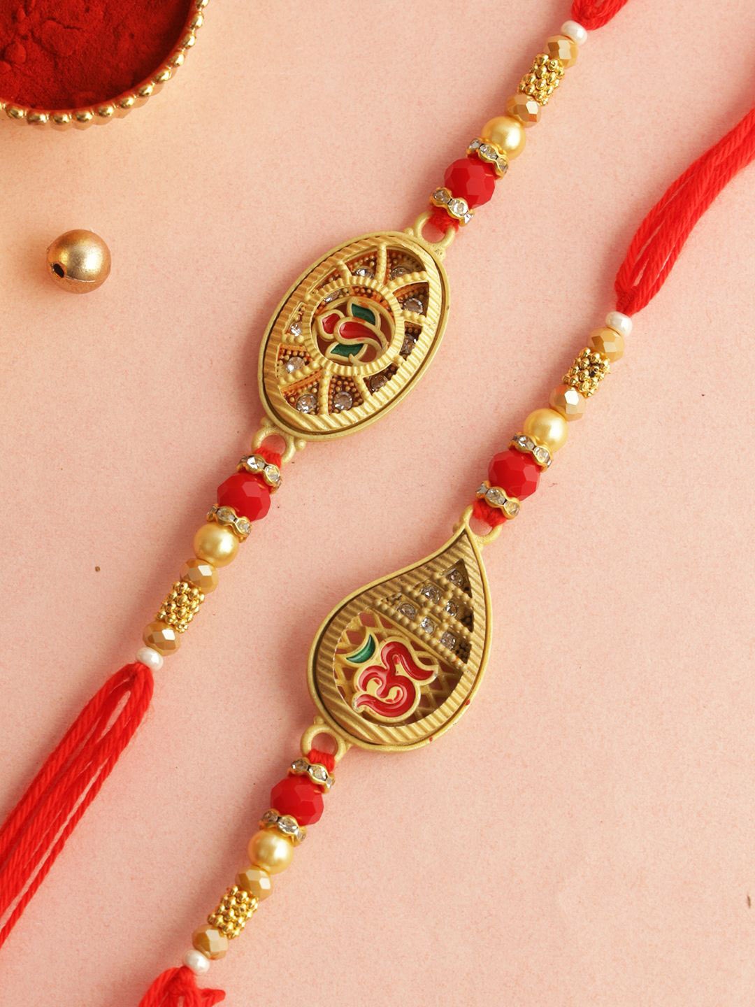 

Aapno Rajasthan Set of 2 Beaded Rakhi with Roli Chawal & Greeting Card, Gold