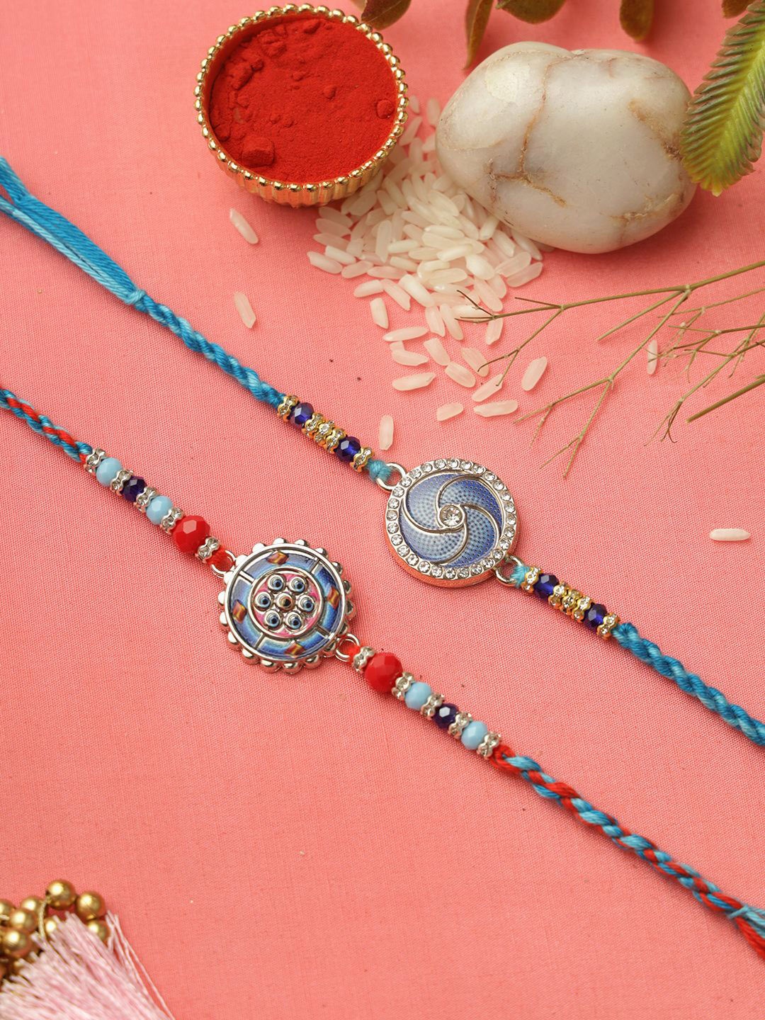 

Aapno Rajasthan Set of 2 Enameled Rakhi with Roli Chawal & Greeting Card, Blue
