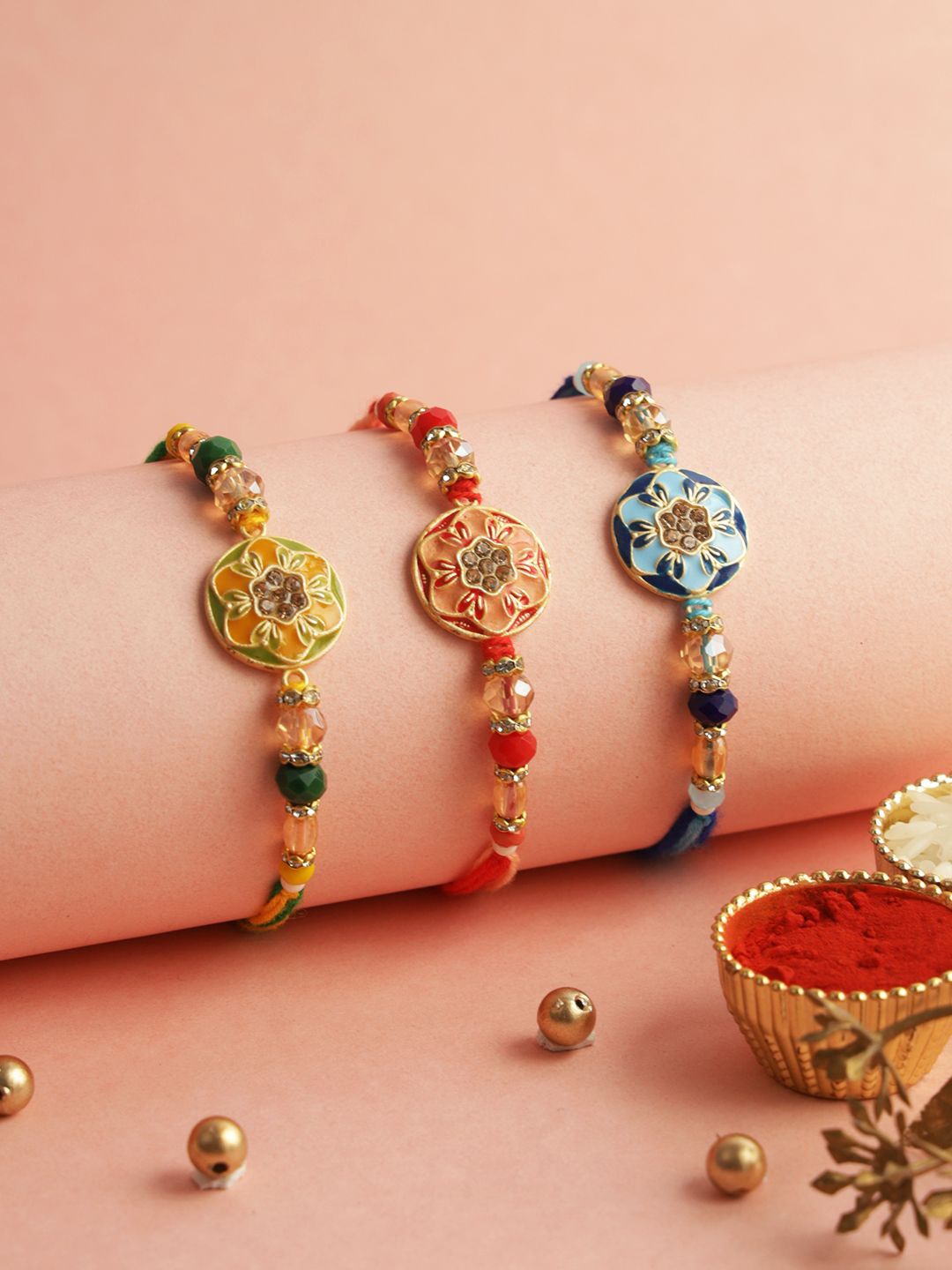 

Aapno Rajasthan Set of 3 Stoned-Studded Enameled Rakhi with Roli Chawal & Greeting Card, Blue