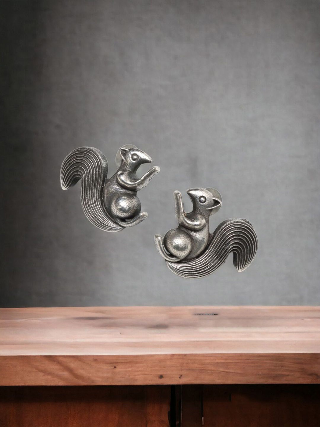 

Ozanoo Silver-Plated Contemporary Studs Earrings