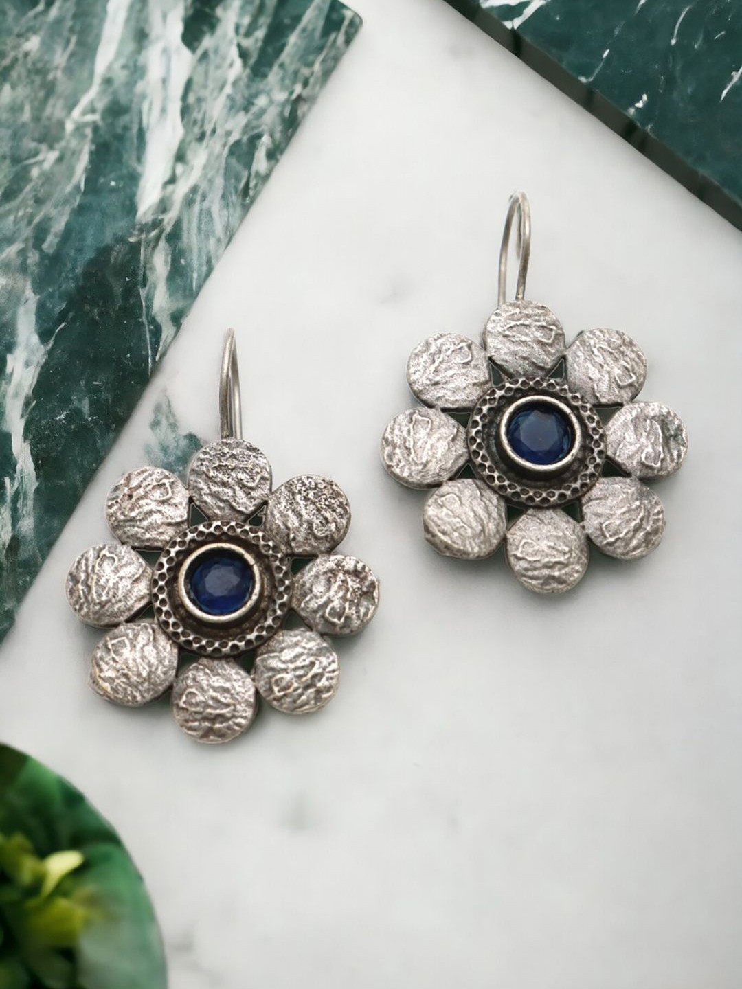

Ozanoo Silver-Plated Stones Studded Floral Stud Earrings