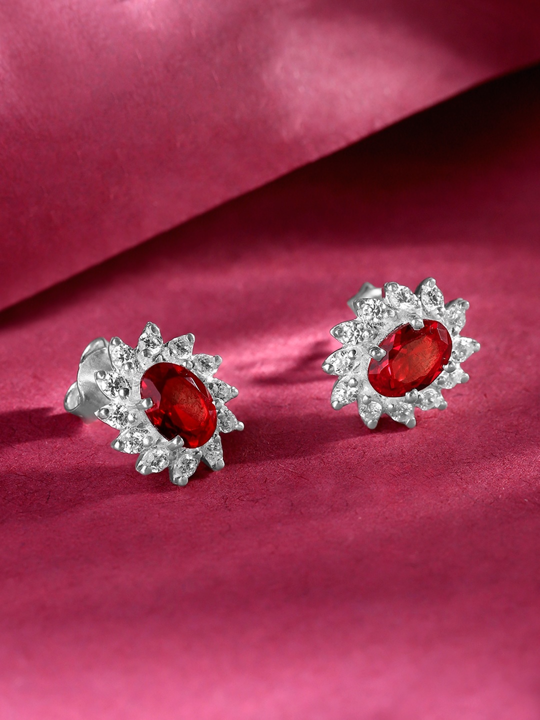 

Unniyarcha Stones-Studded Contemporary Studs Earrings, Silver