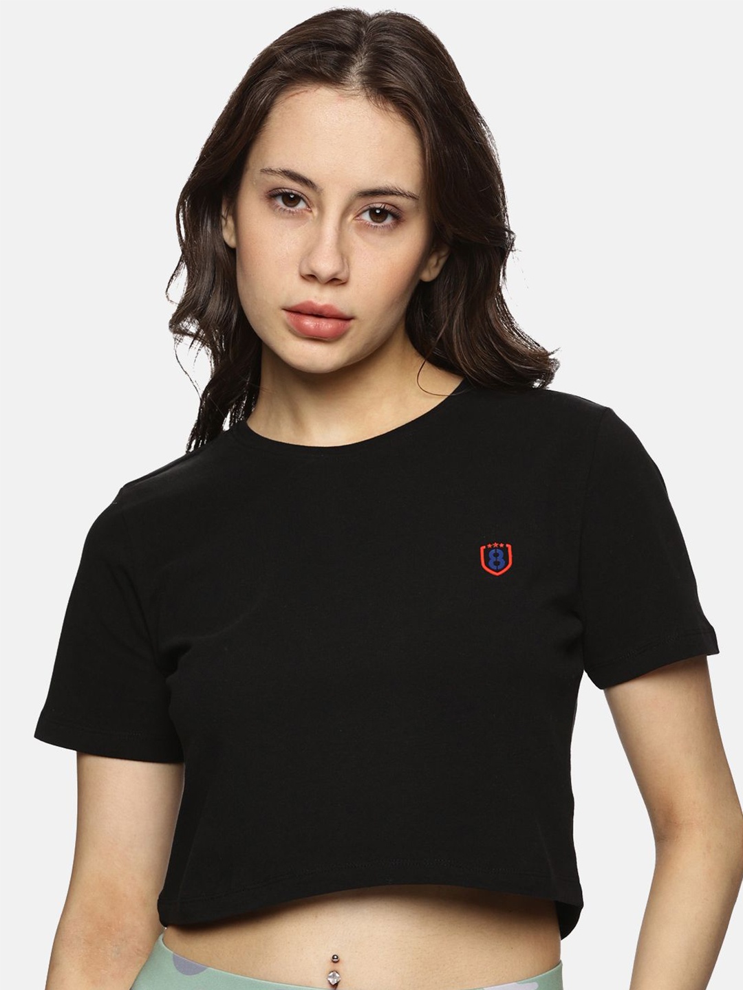 

DOMIN8 Women Solid Round Neck T-shirt, Black